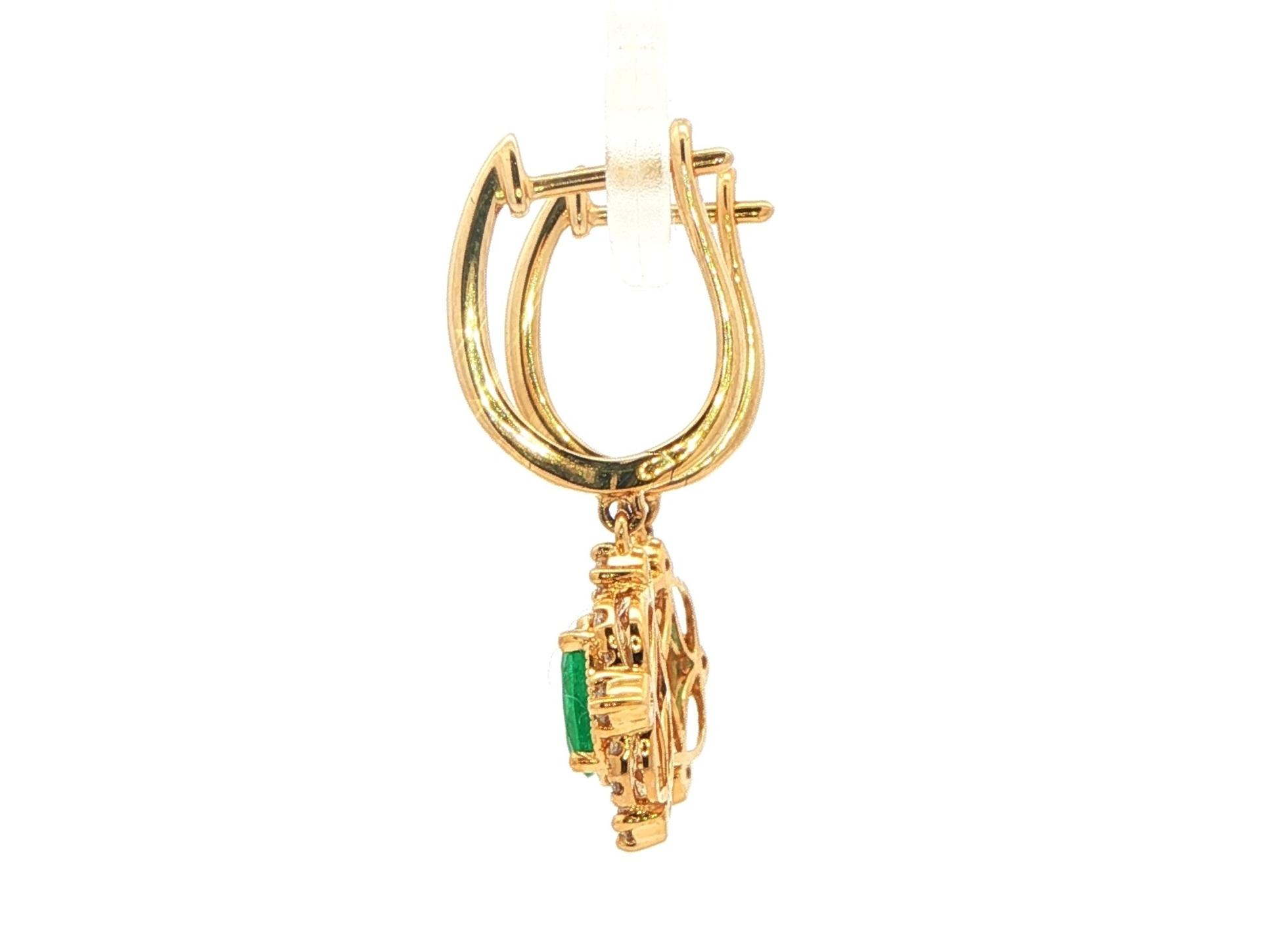 Vintage Style Emerald and Diamond Halo Dangle Earrings in Yellow Gold (1.06cts TWT) side
