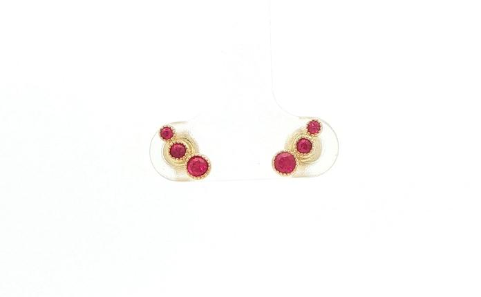 content/products/Graduated 3-Stone Ruby Stud Earrings in Yellow Gold (0.40cts TWT)