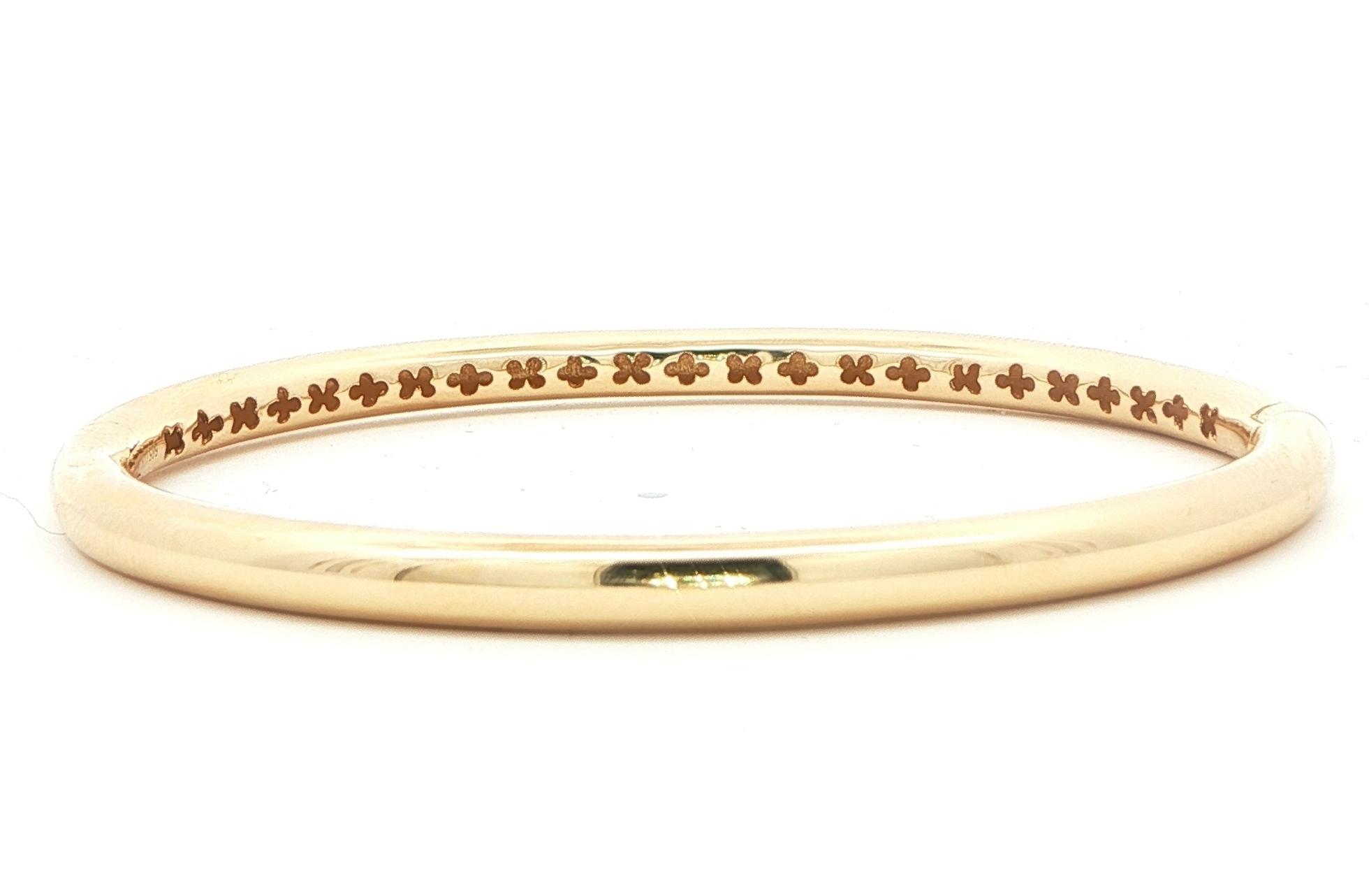 Semi-Solid Hinged Bangle with Interior Floral Design in Yellow Gold