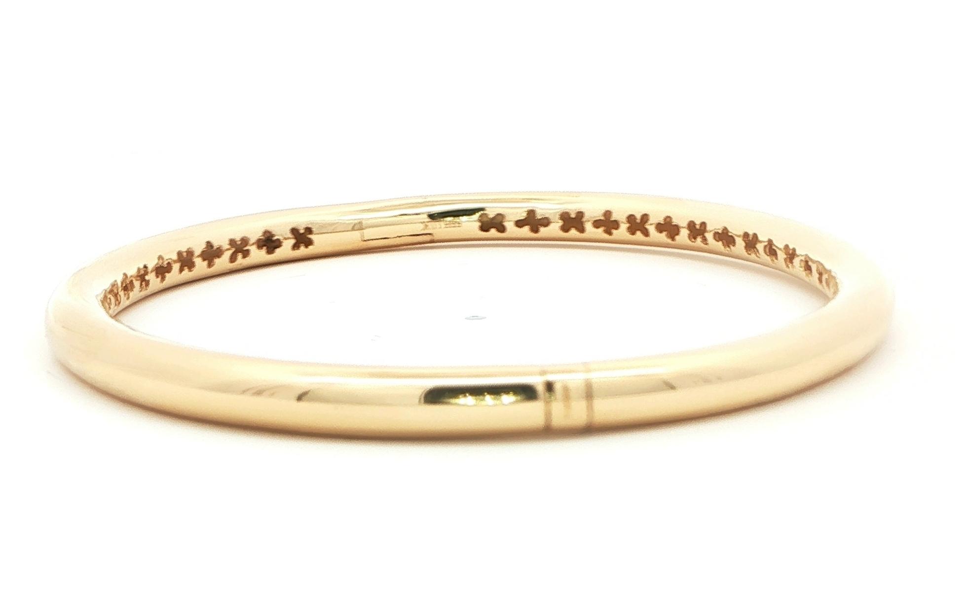 Semi-Solid Hinged Bangle with Interior Floral Design in Yellow Gold side