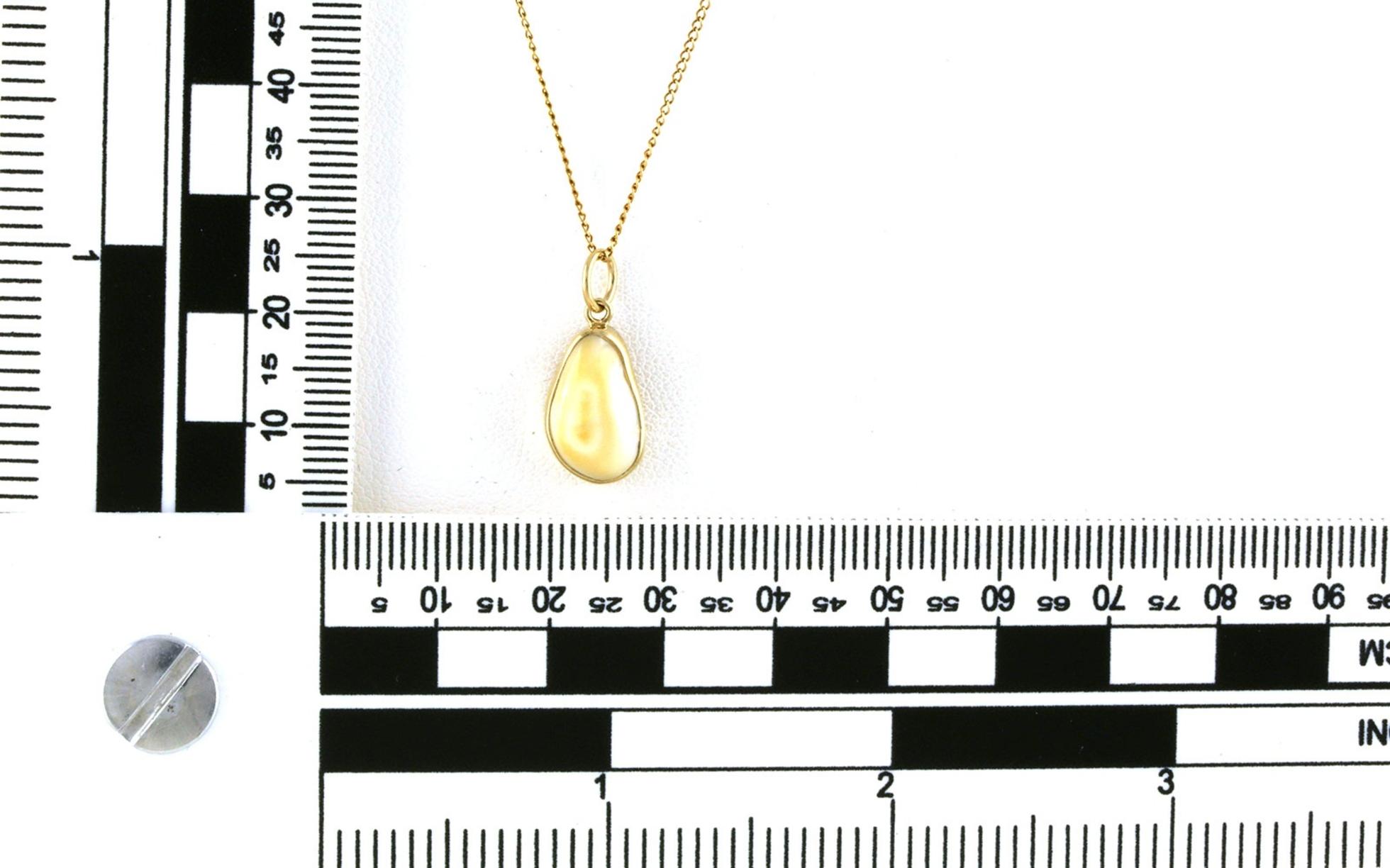 Estate Piece: Bezel-Set Elk Ivory Drop Necklace in Yellow Gold scale