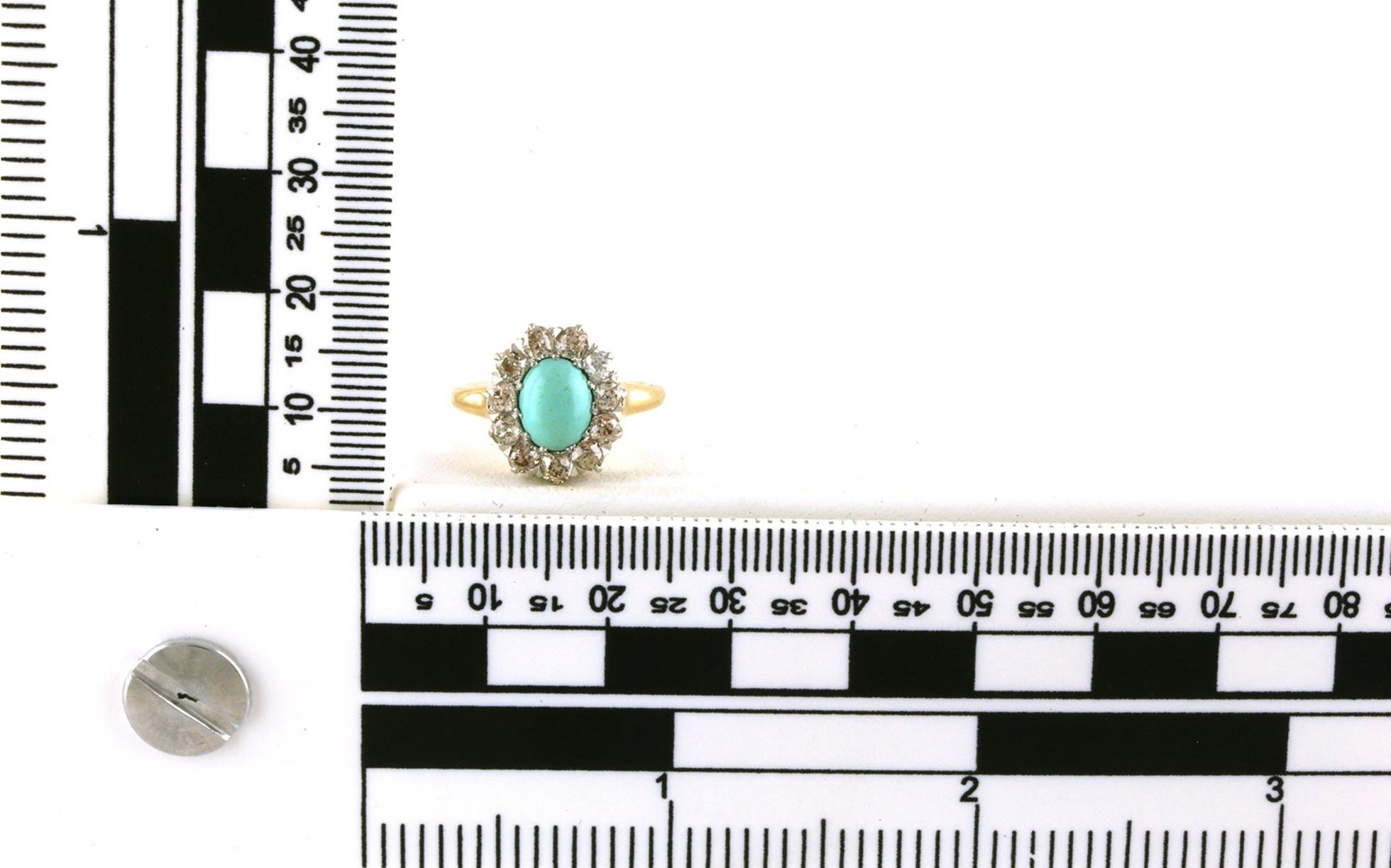 Estate Piece: Oval Turquoise and Diamond Halo Ring in Yellow Gold (0.40cts TWT) scale