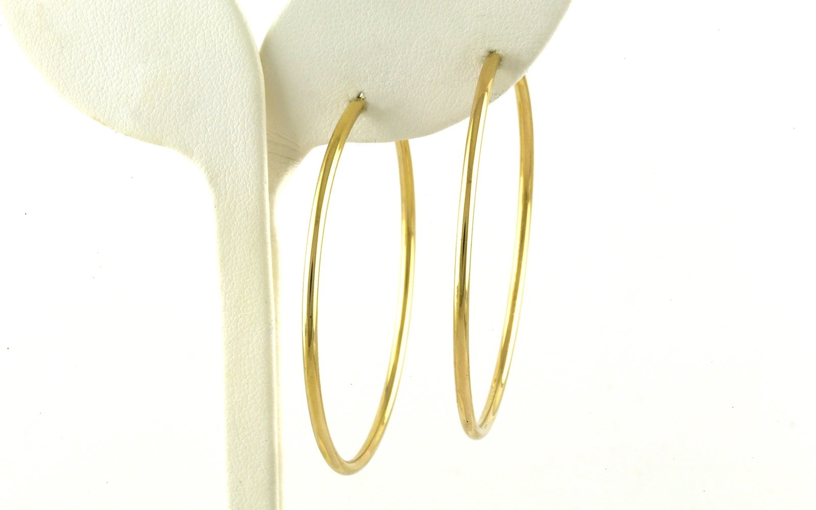 Estate Piece: Large Hollow Infinity Hoop Earrings in Yellow Gold