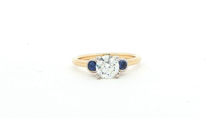 content/products/3-Stone Diamond and Montana Yogo Sapphire Ring in Two-tone Yellow and White Gold (1.26cts TWT)