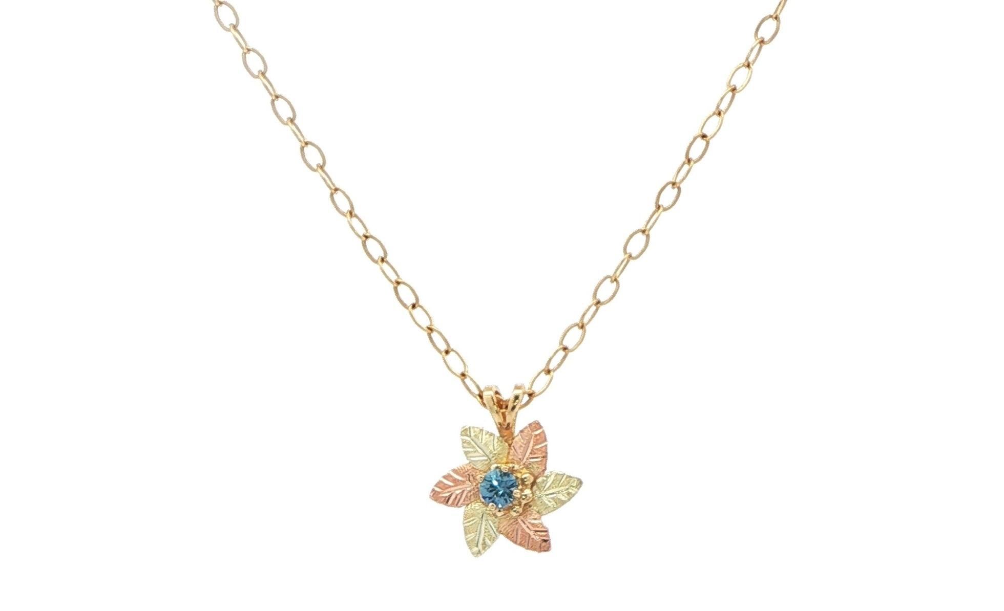 Estate Piece: Montana Sapphire Flower Necklace in Black Hills Yellow and Rose Gold (0.08cts)