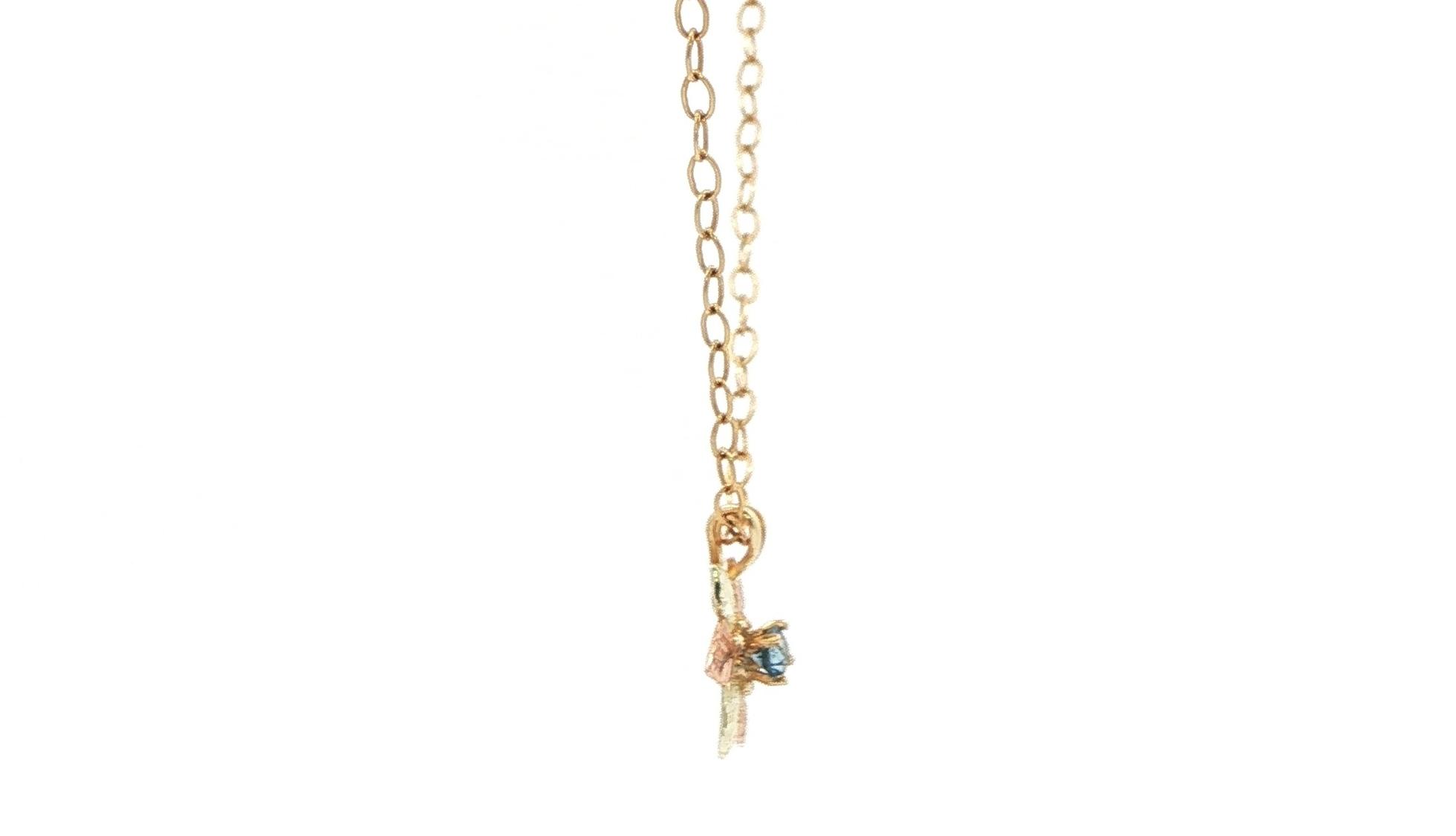 Estate Piece: Montana Sapphire Flower Necklace in Black Hills Yellow and Rose Gold (0.08cts) side