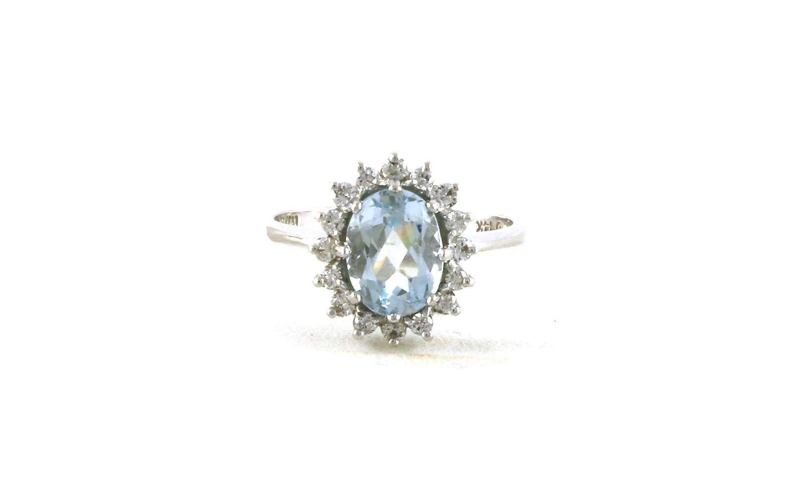 Estate Piece: Oval-cut Aquamarine and Diamond Halo Ring in White Gold (0.20cts TWT)