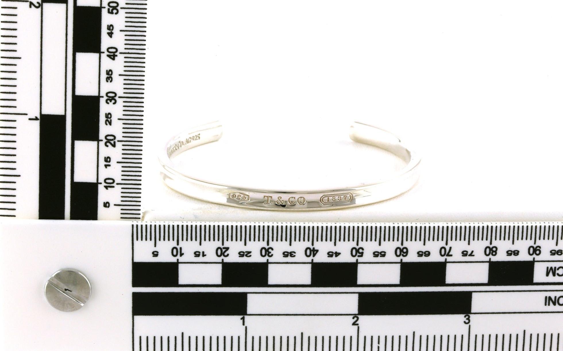 Estate Piece: Tiffany and Co. Cuff Bracelet in Sterling Silver scale
