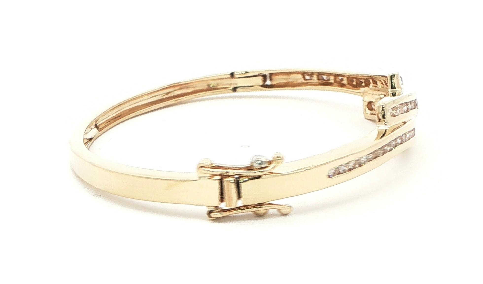 Estate Piece: Bypass-style Channel-set Diamond Hinged Bangle Bracelet in Yellow Gold (1.00cts TWT) side
