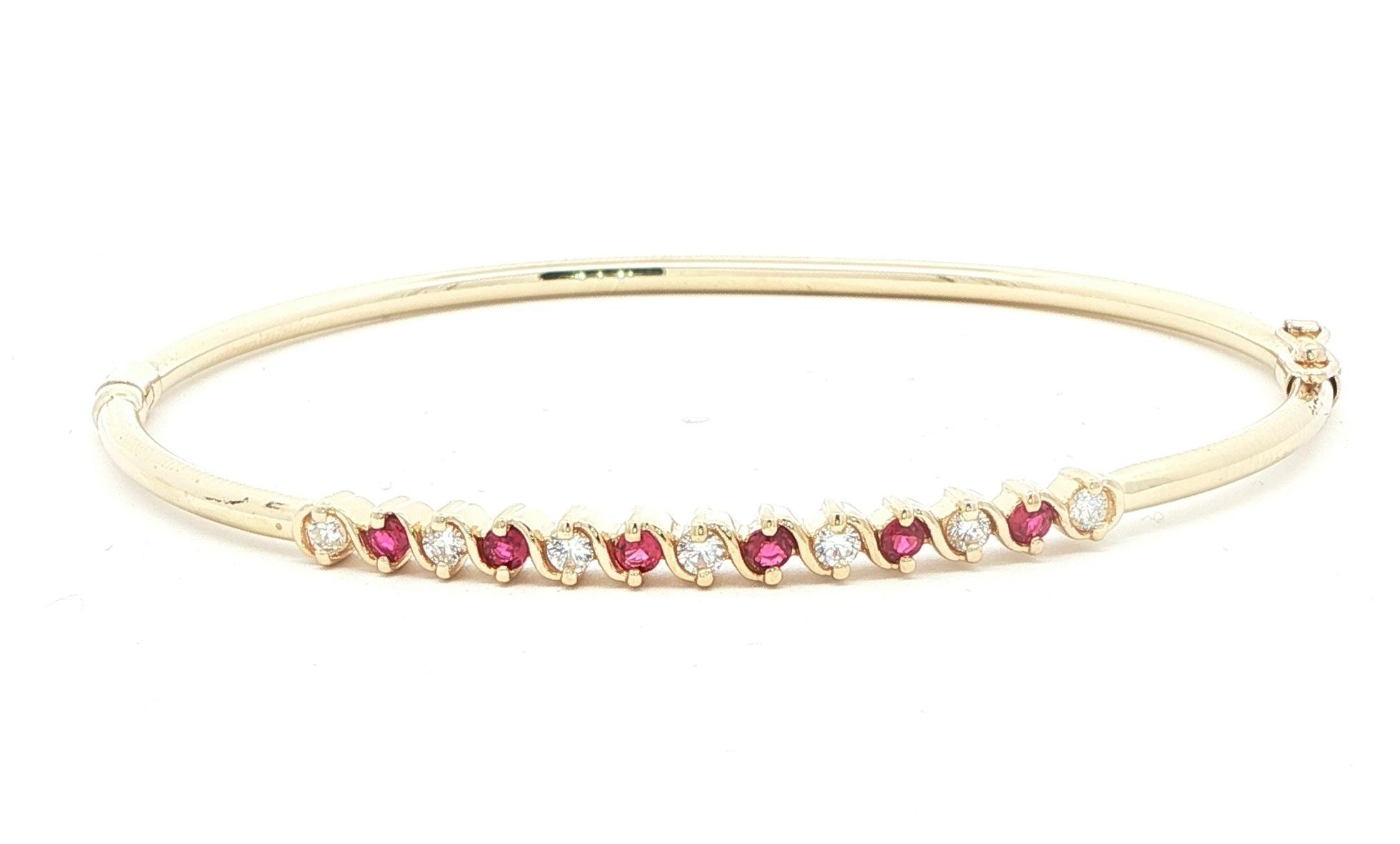 Estate Piece: Alternating Ruby and Diamond Bangle Bracelet in Yellow Gold (0.45cts TWT)