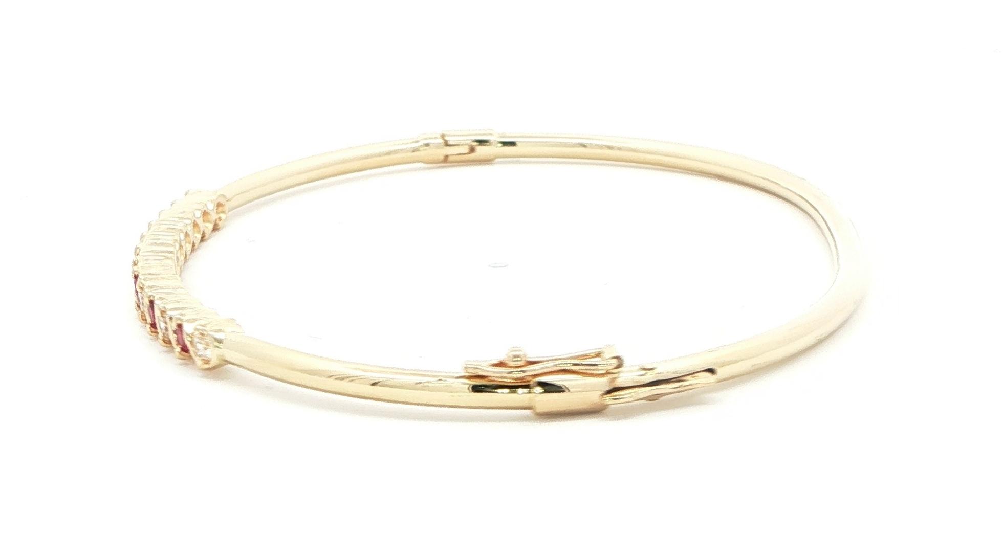 Estate Piece: Alternating Ruby and Diamond Bangle Bracelet in Yellow Gold (0.45cts TWT) side