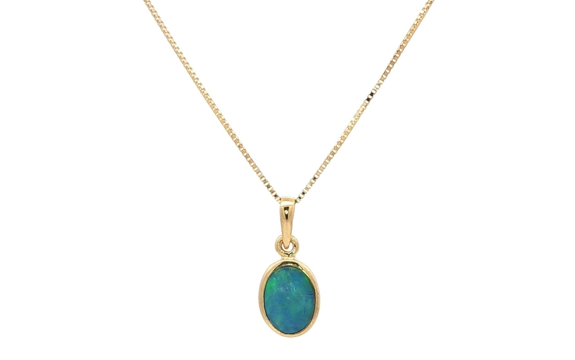 Estate Piece: Oval Bluish-Green Opal Doublet Charm Necklace in Yellow Gold