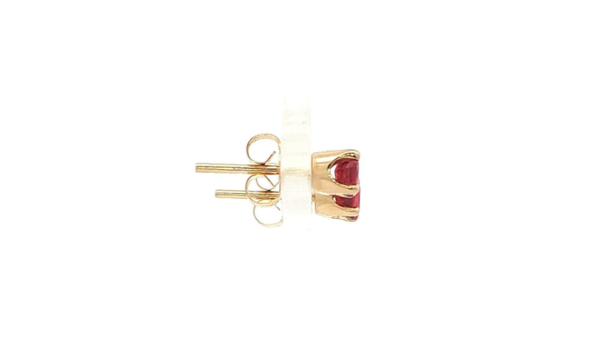 Estate Piece: Ruby Stud Earrings in 4-Prong Settings in Yellow Gold (0.50cts TWT) side