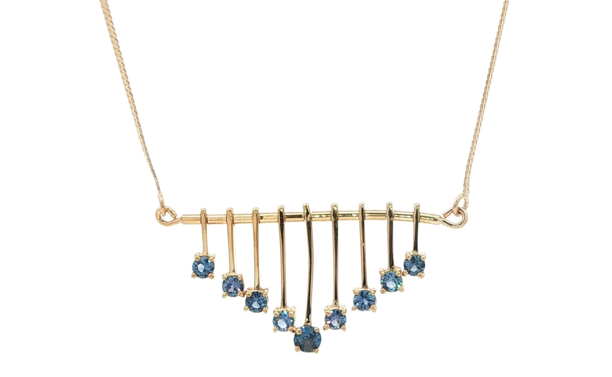 Estate Piece: Wind Chime 9-Stone Montana Yogo Sapphire Necklace in Yellow Gold (0.50cts TWT)
