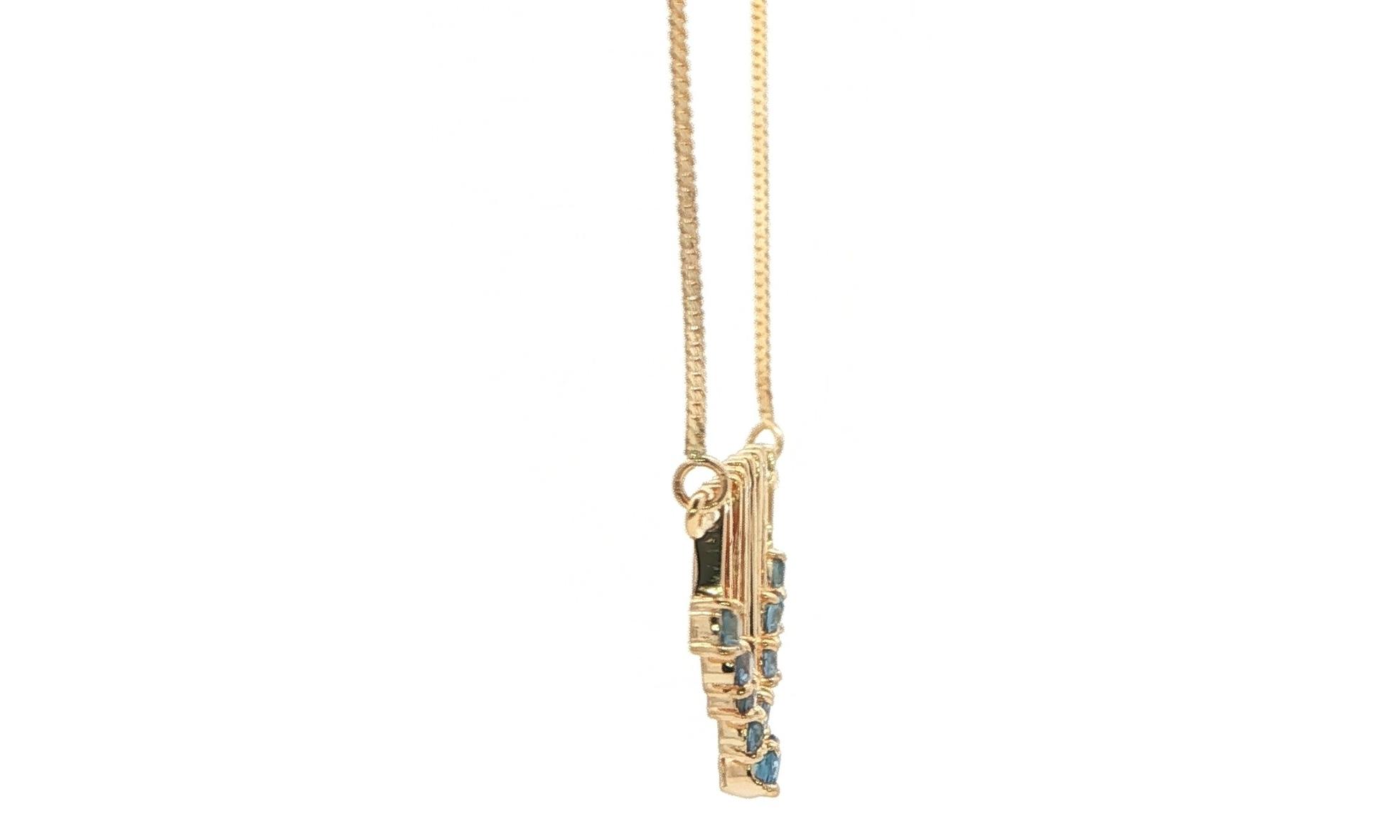 Estate Piece: Wind Chime 9-Stone Montana Yogo Sapphire Necklace in Yellow Gold (0.50cts TWT) side