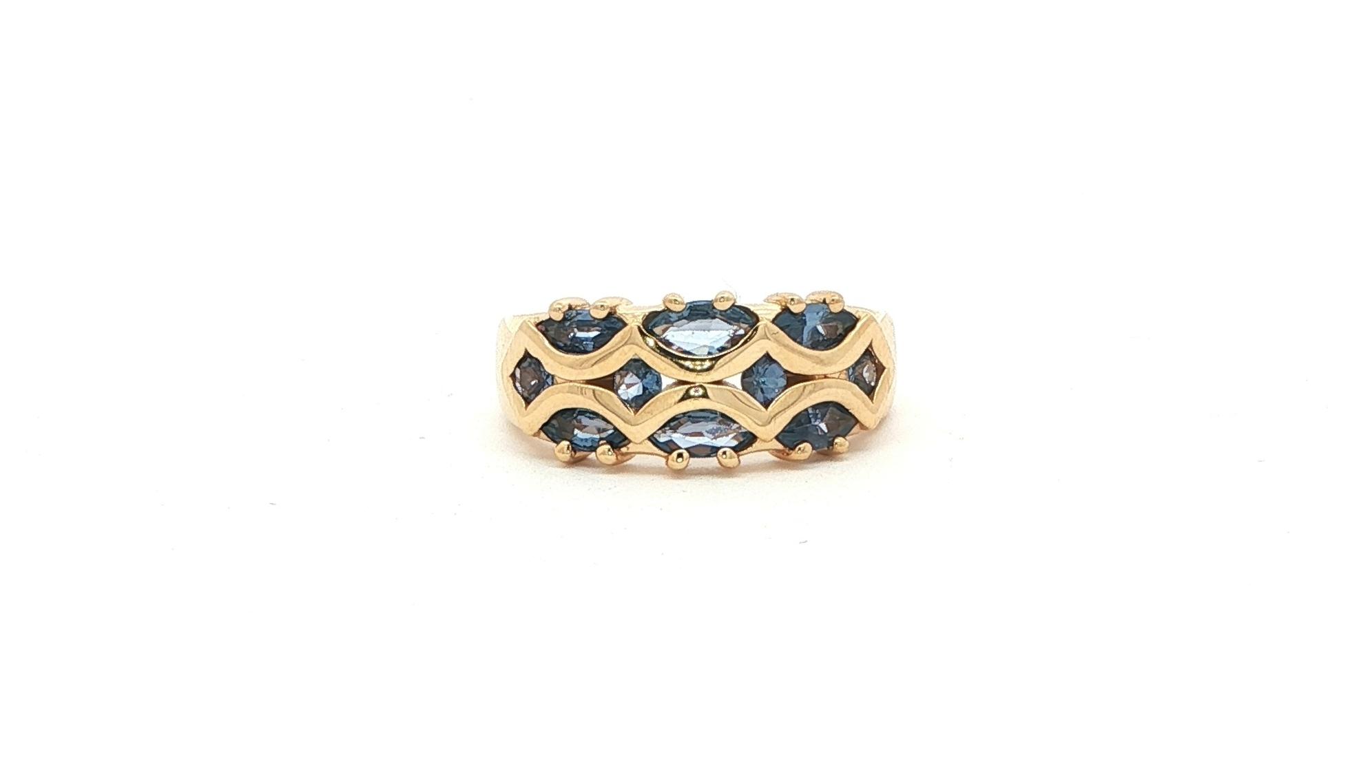 Estate Piece: 3-Row Marquise-cut and Round-cut Montana Yogo Sapphire Ring in Yellow Gold (1.12cts TWT)