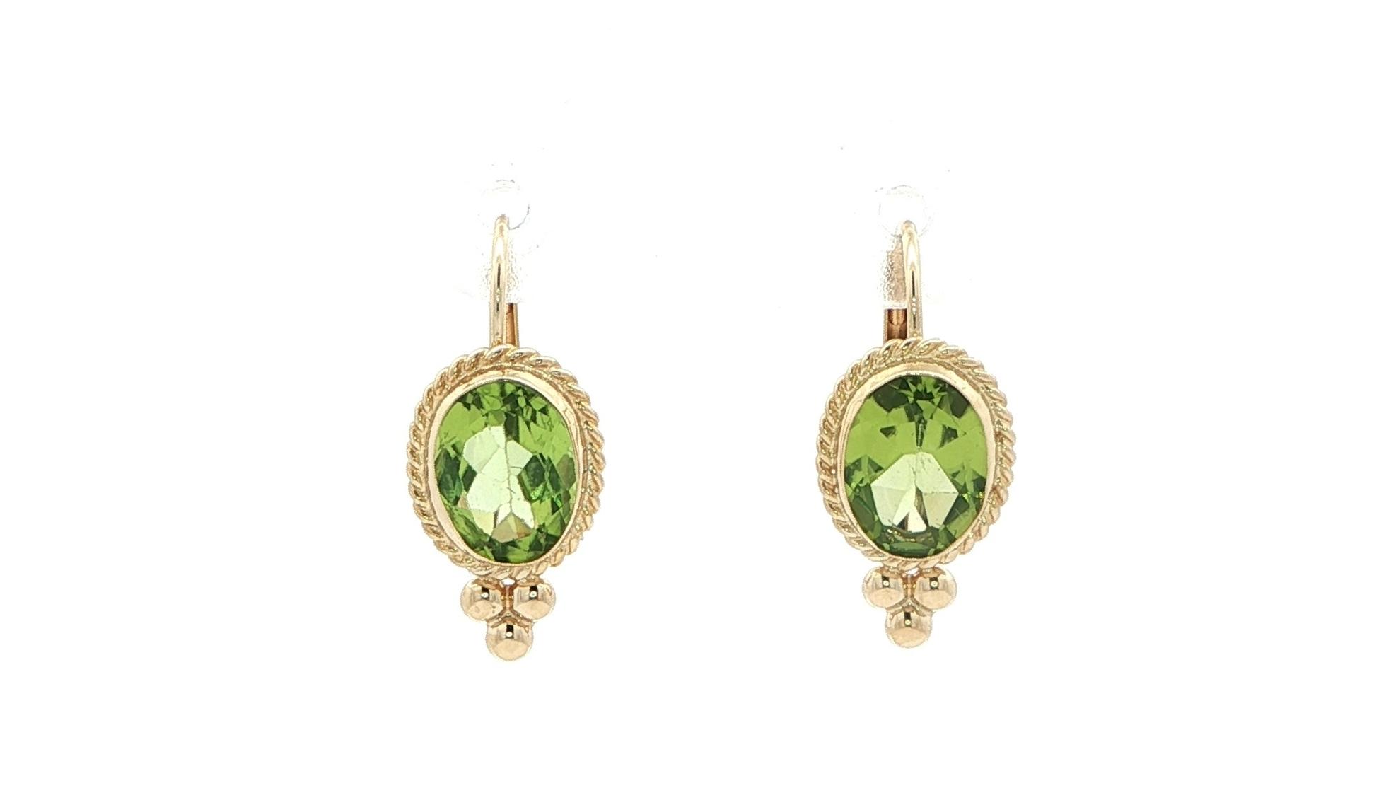 Estate Piece: Oval Peridot Dangle Earrings with Rope and Bead Details in Yellow Gold (2.50cts TWT)