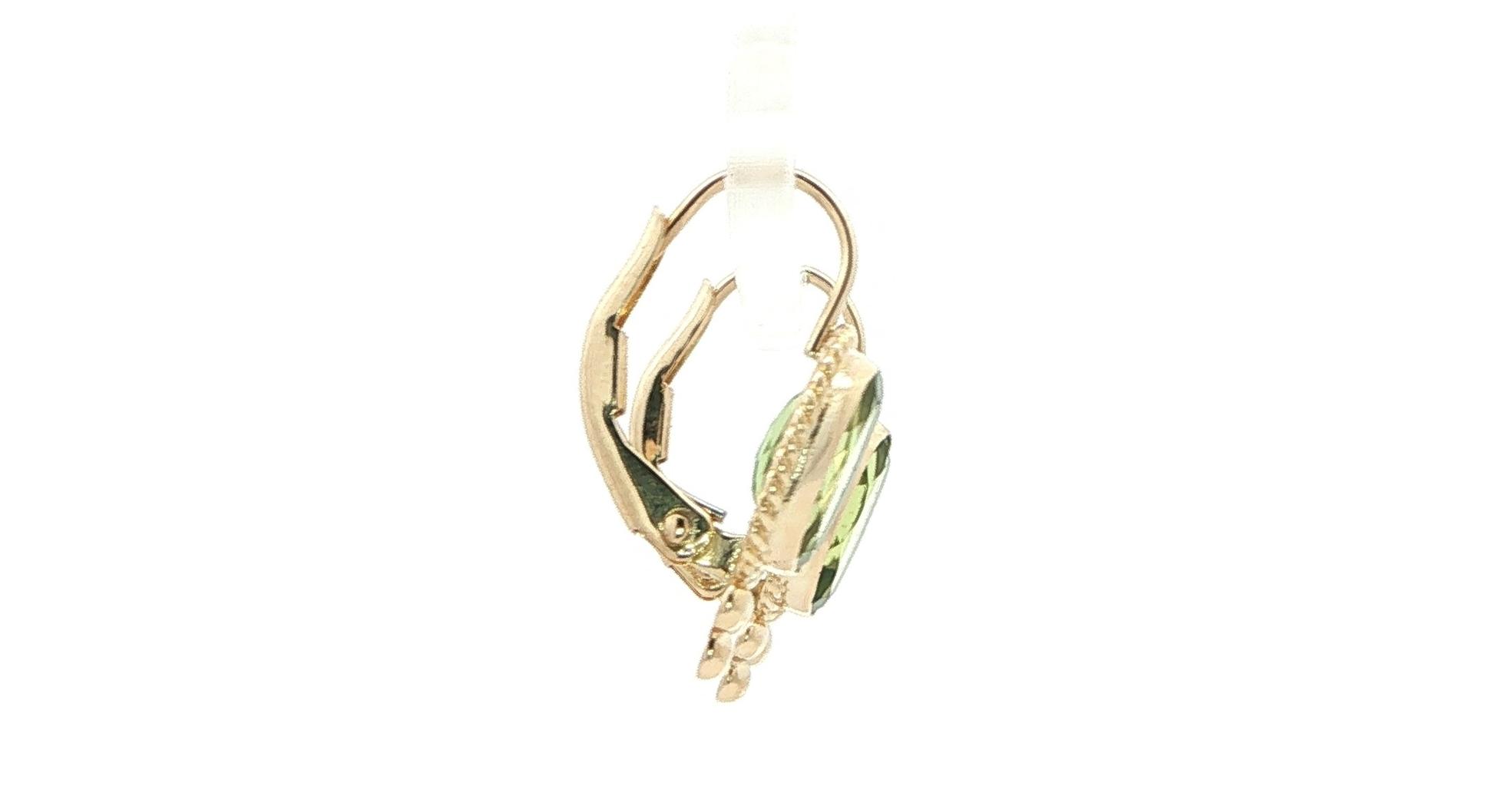 Estate Piece: Oval Peridot Dangle Earrings with Rope and Bead Details in Yellow Gold (2.50cts TWT) side