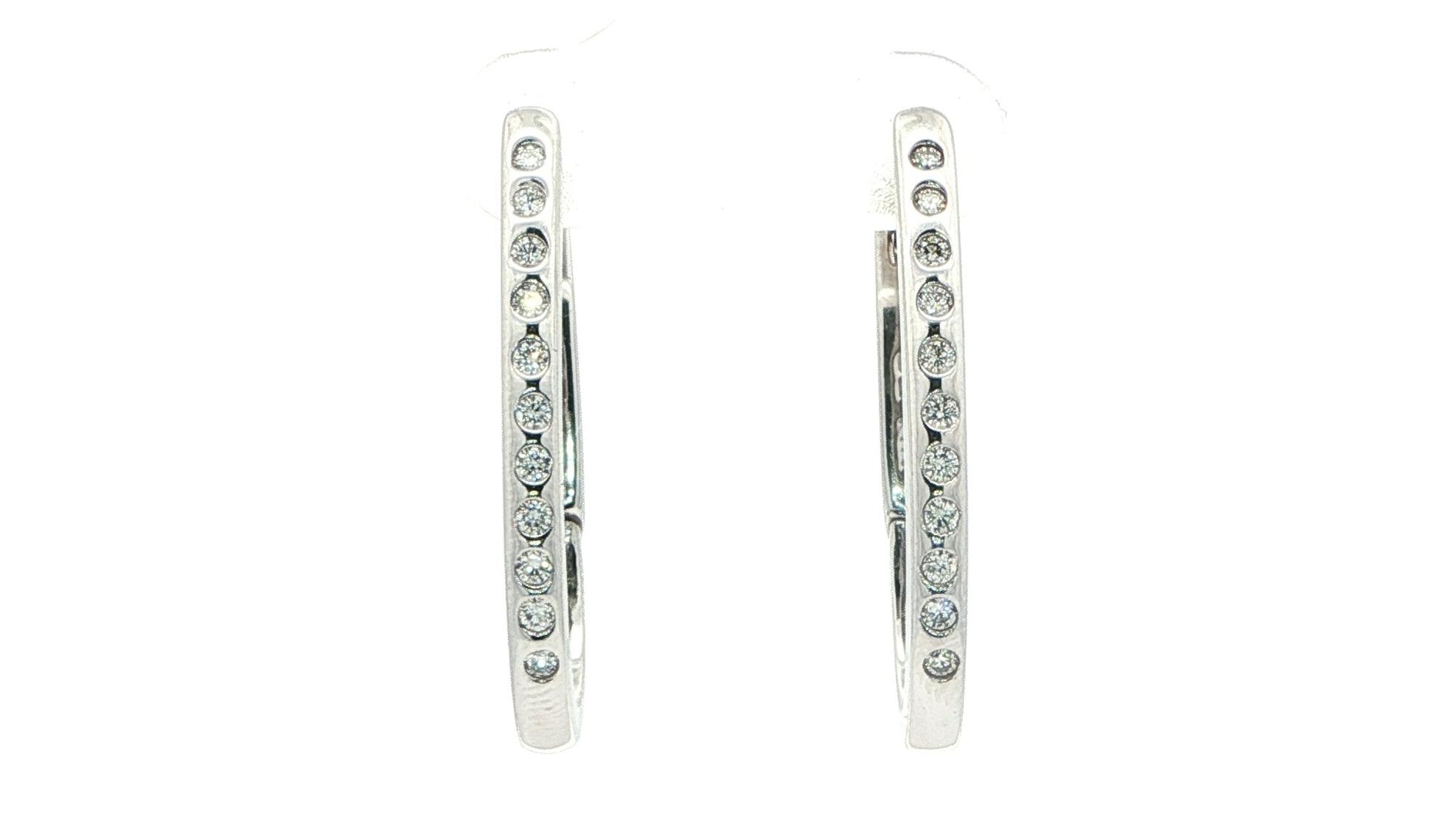 Estate Piece: Elongated Flush-set Diamond Hoop Earrings in White Gold (0.25cts TWT)