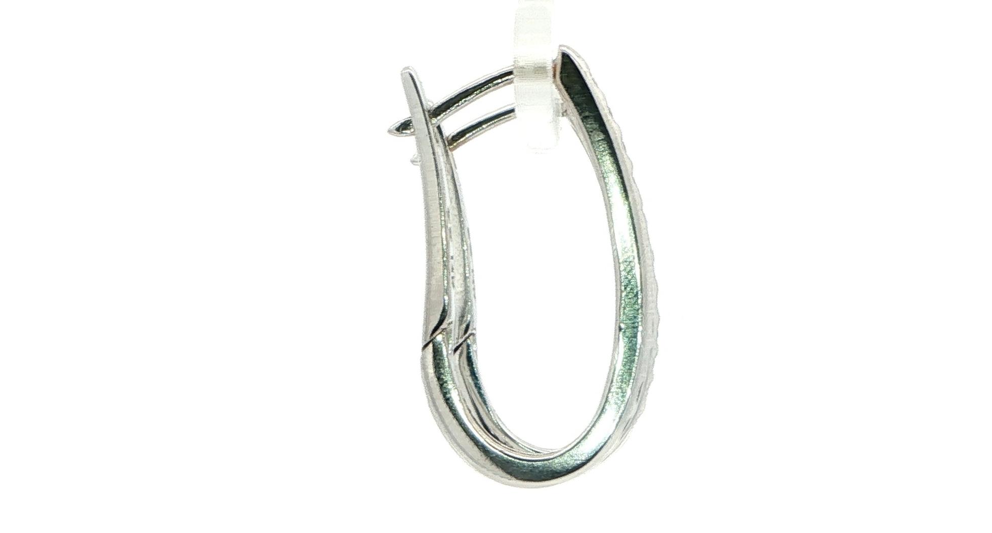 Estate Piece: Elongated Flush-set Diamond Hoop Earrings in White Gold (0.25cts TWT) side