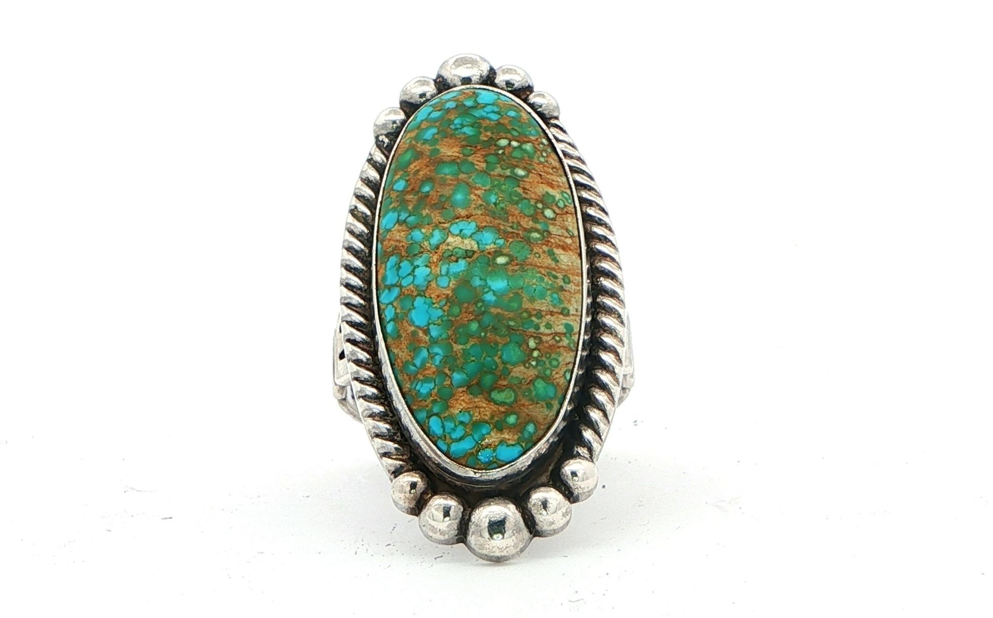 Estate Piece: Oval Cabochon Turquoise Cocktail Ring with Bead and Rope Details in Sterling Silver
