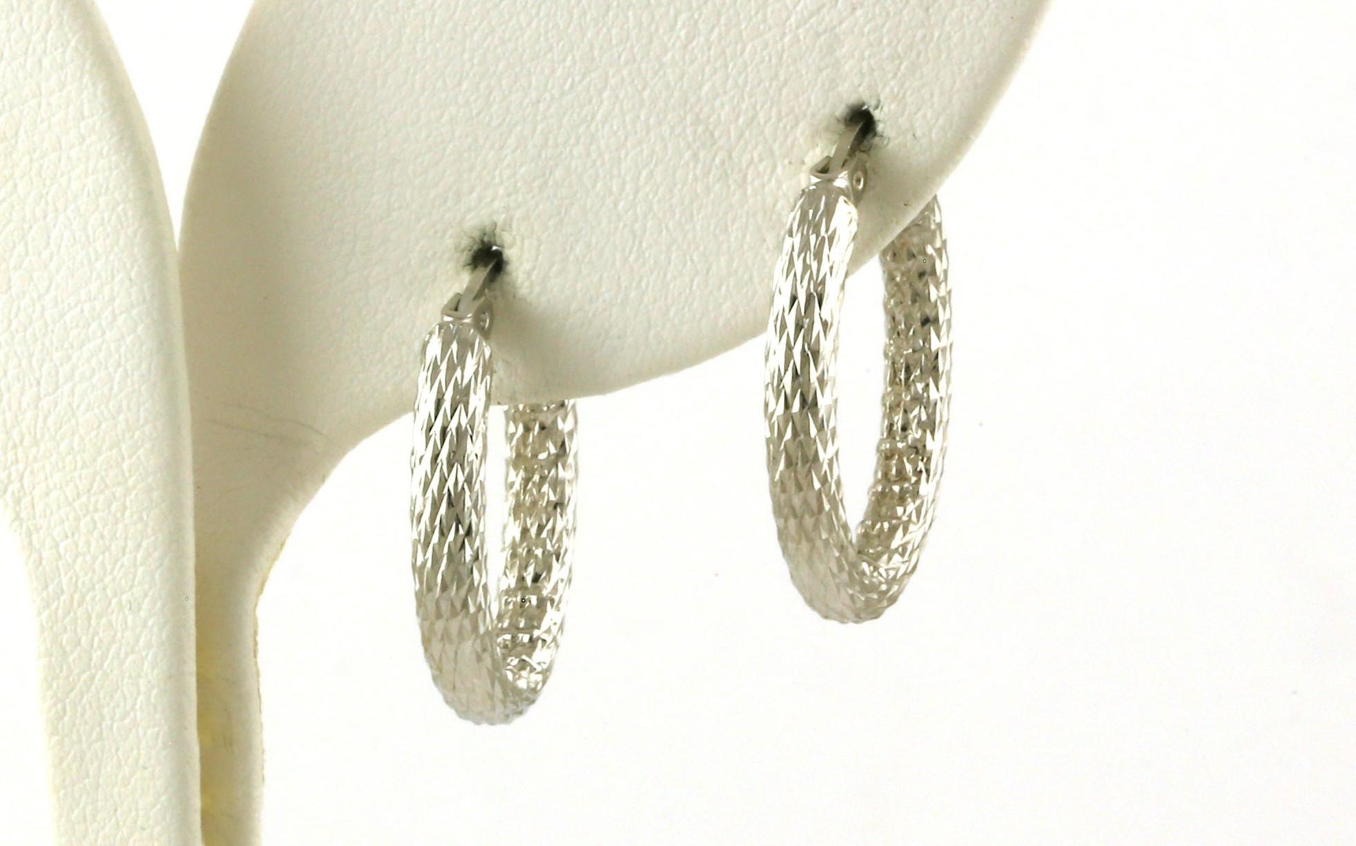 Diamond-cut Oval Hoop Earrings in Sterling Silver