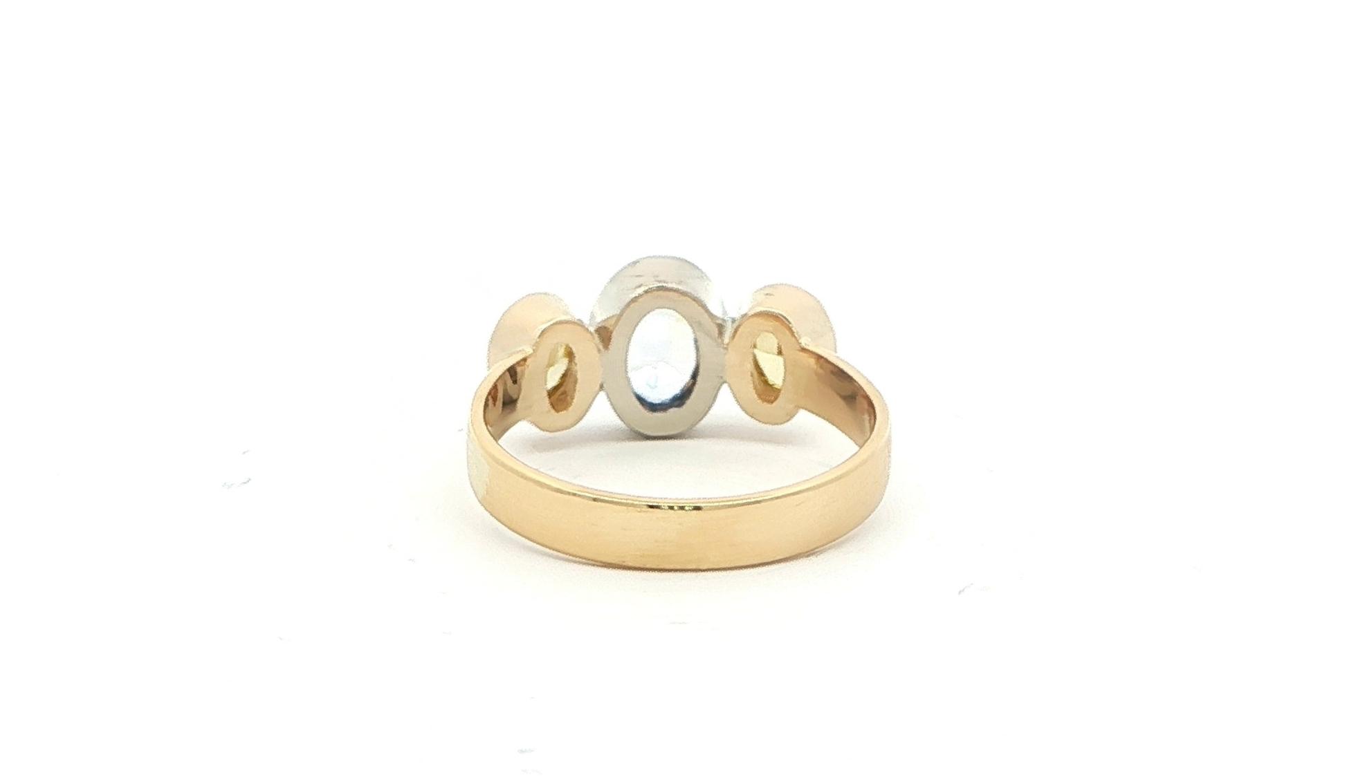Estate Piece: 3-Stone Oval Pale Blue Sapphire and Yellow Diamond Ring in Two-tone Yellow and White Gold (1.50cts TWT) back