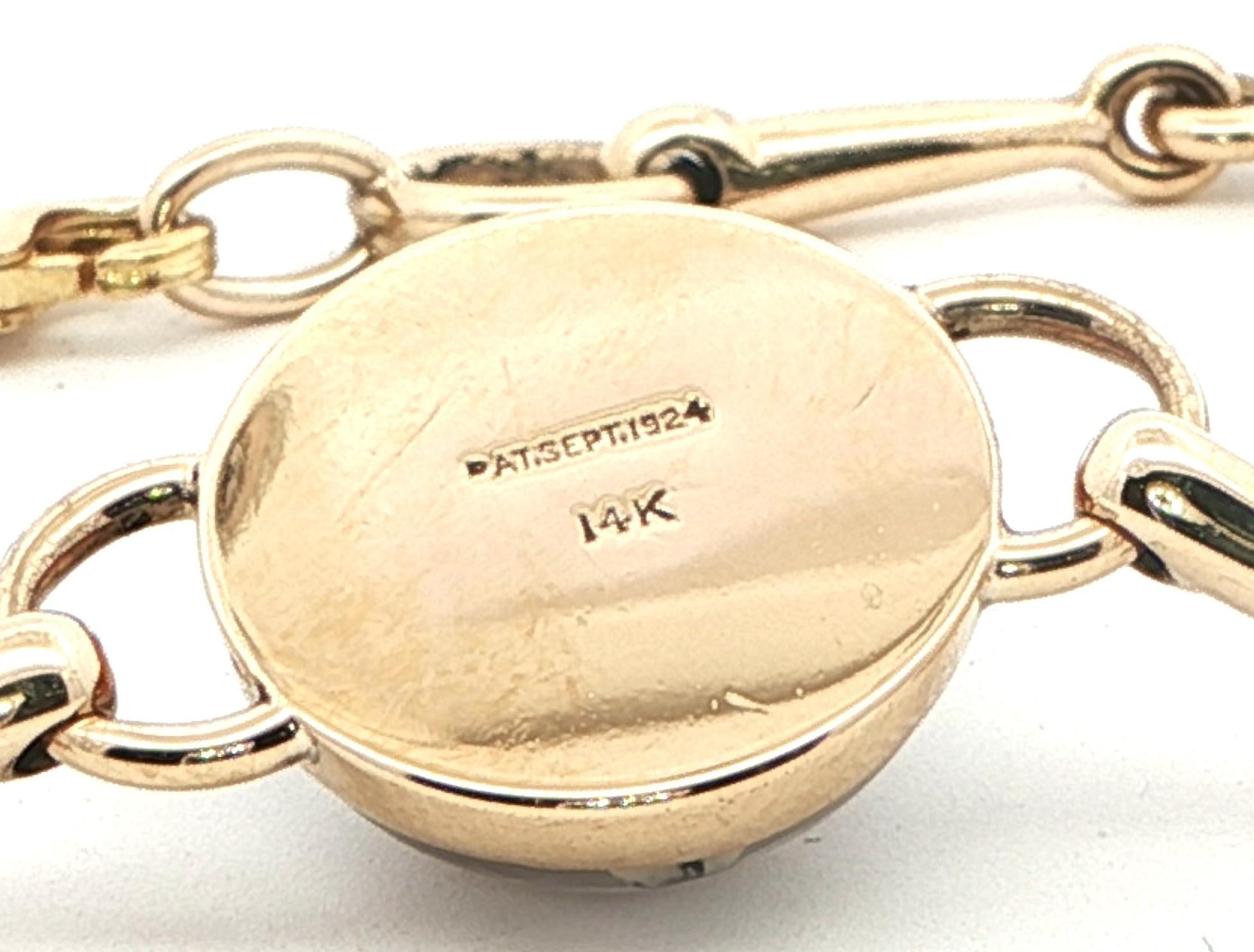 Estate Piece: Essex Crystal Carved and Painted Illustrative Hunting Bracelet in Yellow Gold stamp