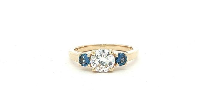 content/products/Three-Stone Diamond and Montana Yogo Sapphire Ring in Yellow Gold (1.42cts TWT)