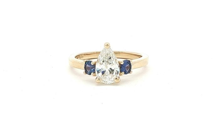 content/products/3-Stone Pear Shaped Diamond and Round Montana Yogo Sapphire Ring in Yellow Gold (1.41cts TWT)