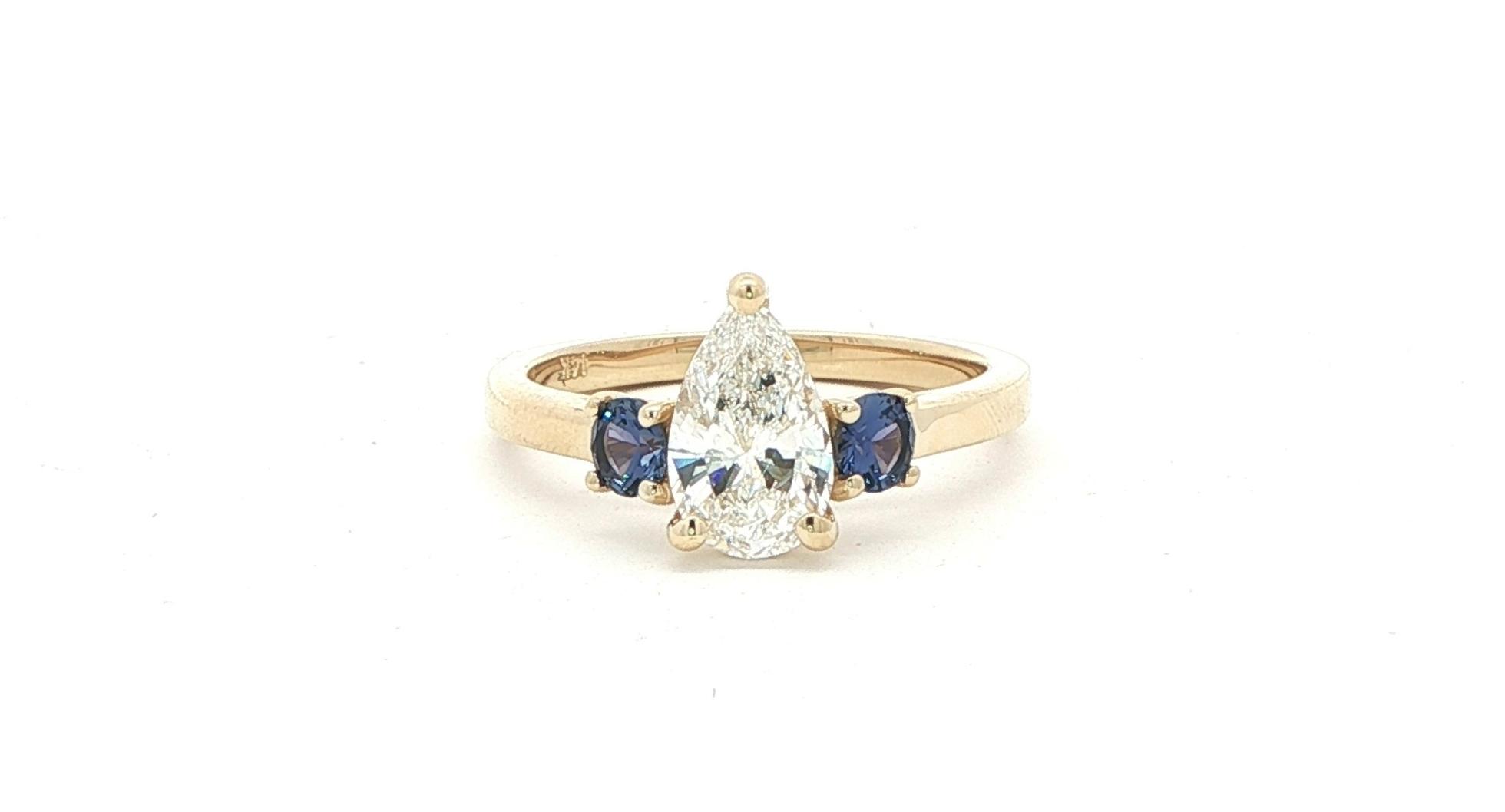 3-Stone Pear Shaped Diamond and Round Montana Yogo Sapphire Ring in Yellow Gold (1.41cts TWT)