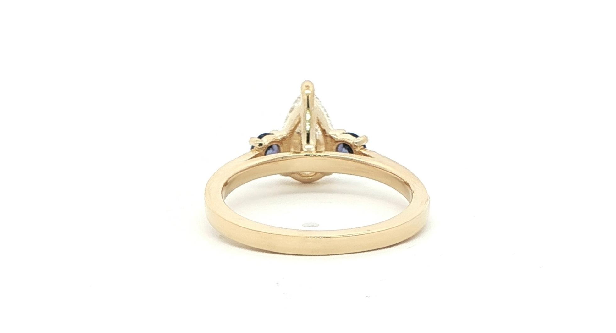 3-Stone Pear Shaped Diamond and Round Montana Yogo Sapphire Ring in Yellow Gold (1.41cts TWT) back