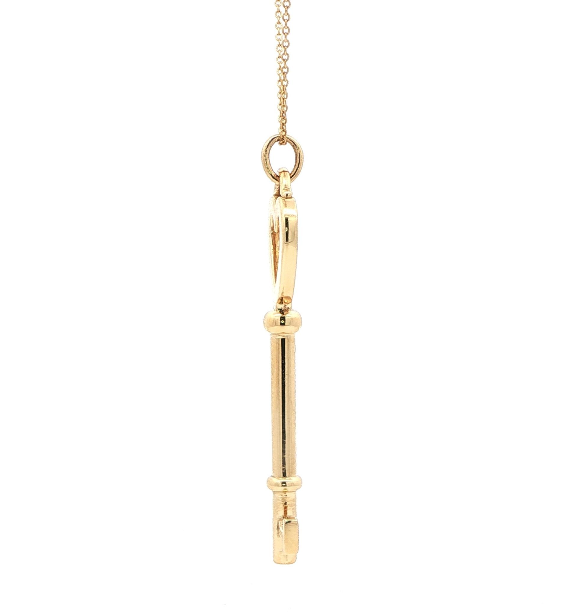 Estate Piece: Tiffany & Co. Key and Heart Necklace in Yellow Gold side