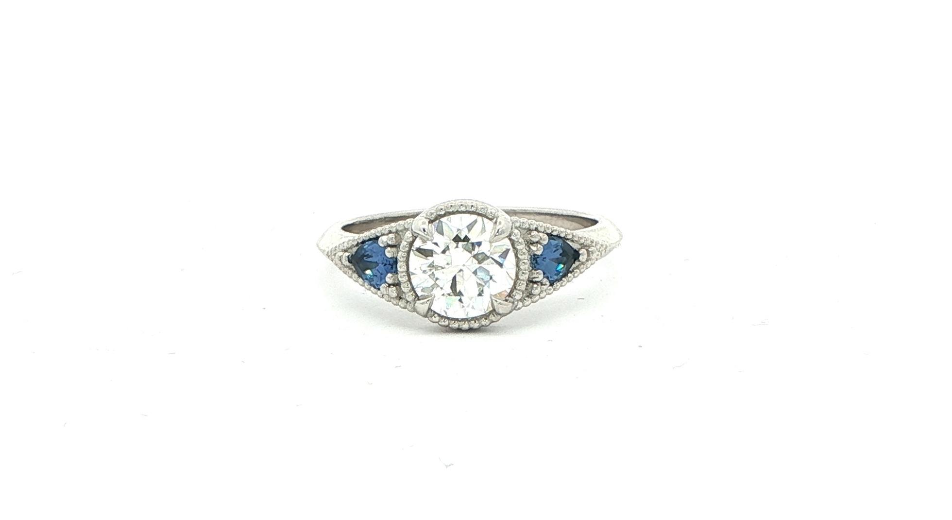 3-Stone Diamond and Pear-cut Montana Yogo Sapphire Engagement Ring with Milgrain Details in Platinum (1.32cts TWT)