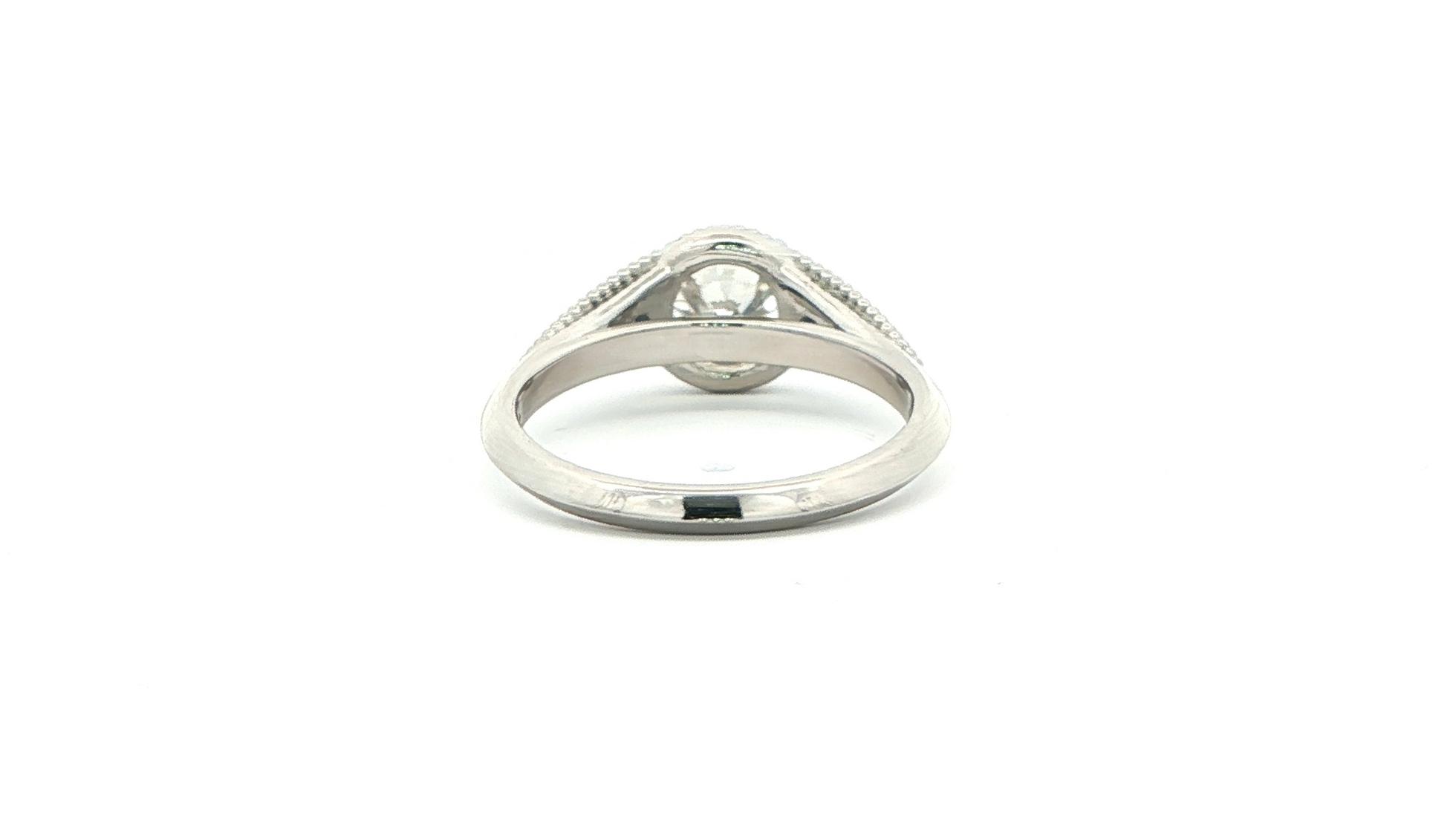 3-Stone Diamond and Pear-cut Montana Yogo Sapphire Engagement Ring with Milgrain Details in Platinum (1.32cts TWT) back