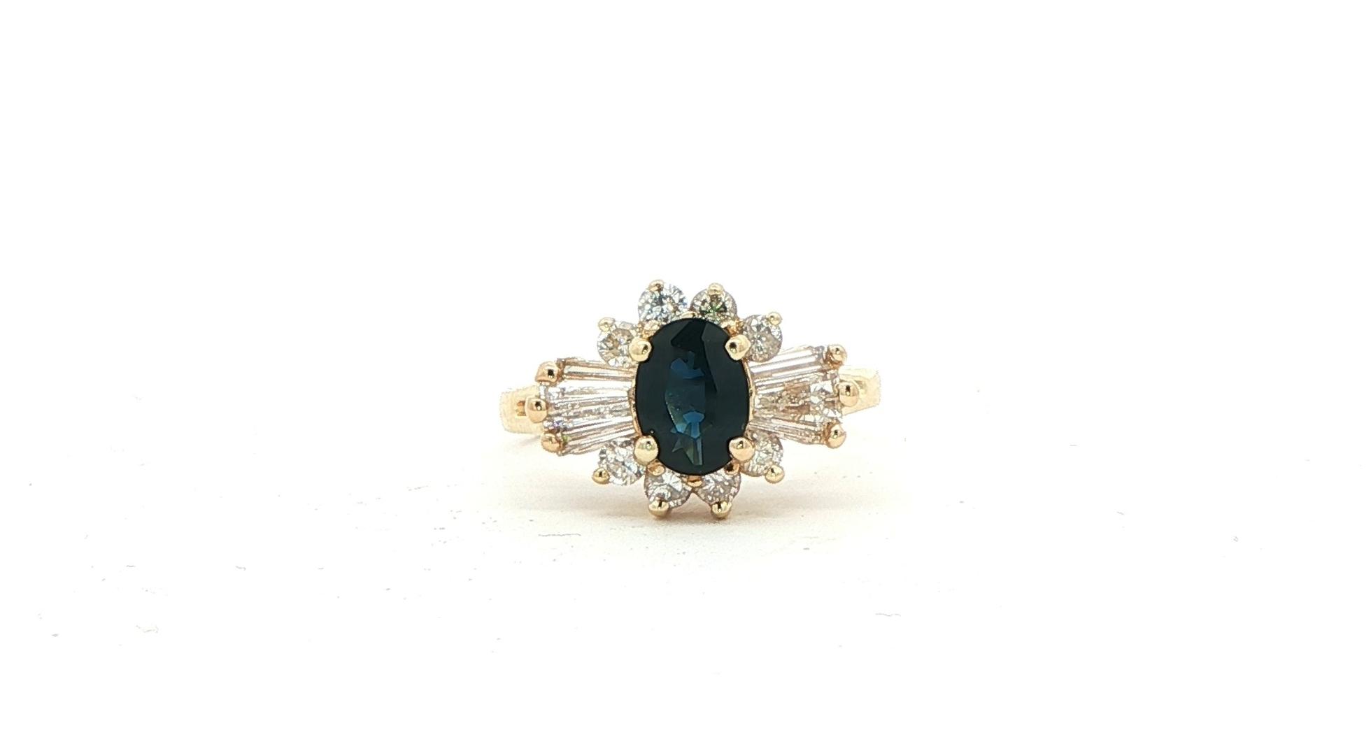 Estate Piece: Elegant Oval Brilliant Cut Deep Blue Sapphire and Diamond Cocktail Ring in Yellow Gold (0.49cts TWT)