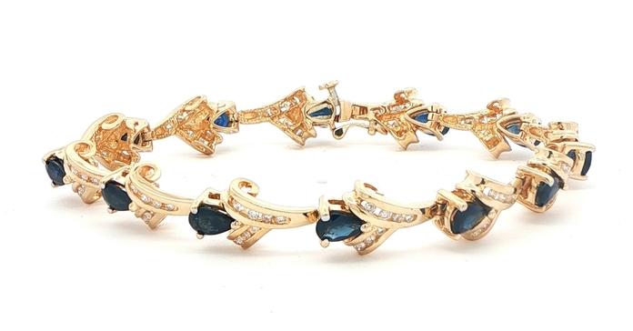 content/products/Estate Piece: Pear-Cut Blue Sapphire and Diamond Scroll Link Bracelet in Yellow Gold (7.26cts TWT)