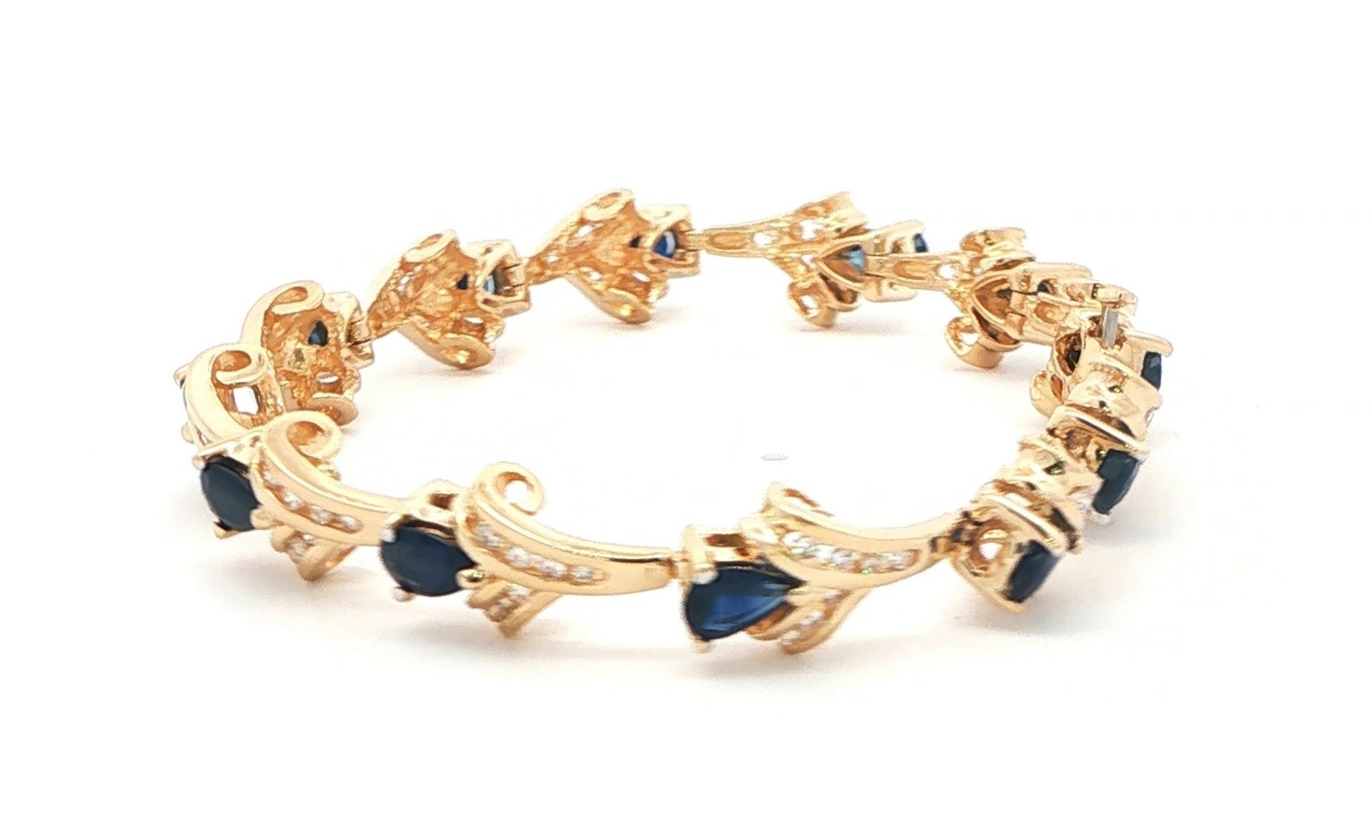 Estate Piece: Pear-Cut Blue Sapphire and Diamond Scroll Link Bracelet in Yellow Gold (7.26cts TWT) side