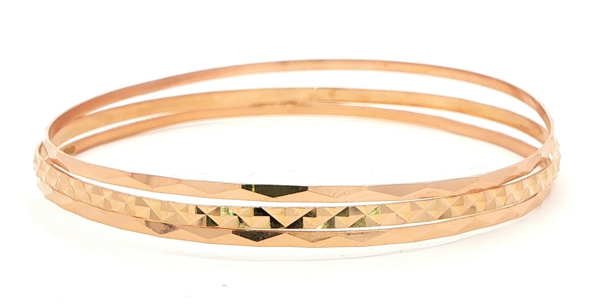 Estate Piece: Triple Stacked Diamond-Cut Bangle Set in Yellow Gold