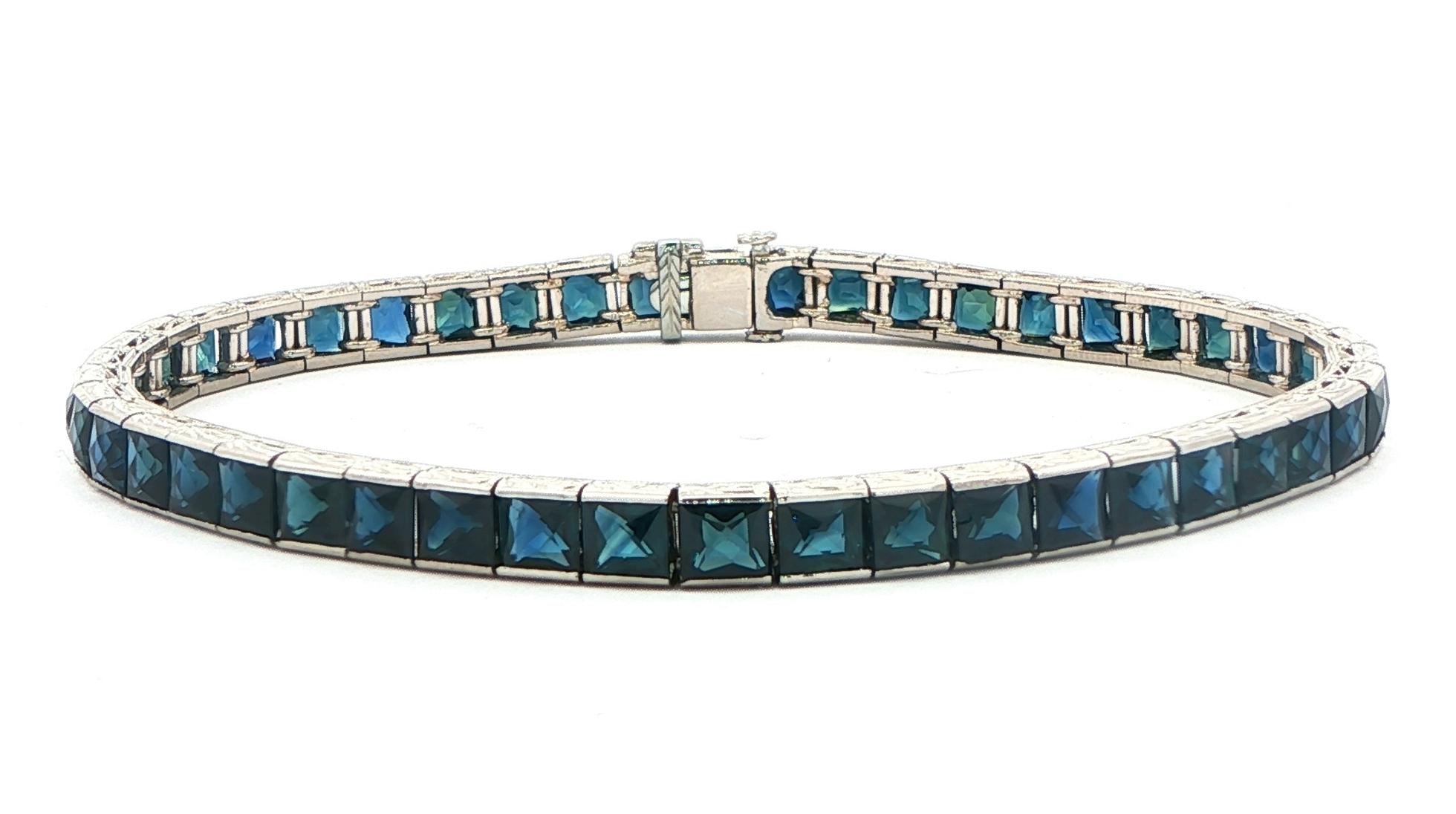Estate Piece: Square-Cut Deep Blue Sapphire Tennis Bracelet with Engraved Details in Platinum (13.00cts TWT)