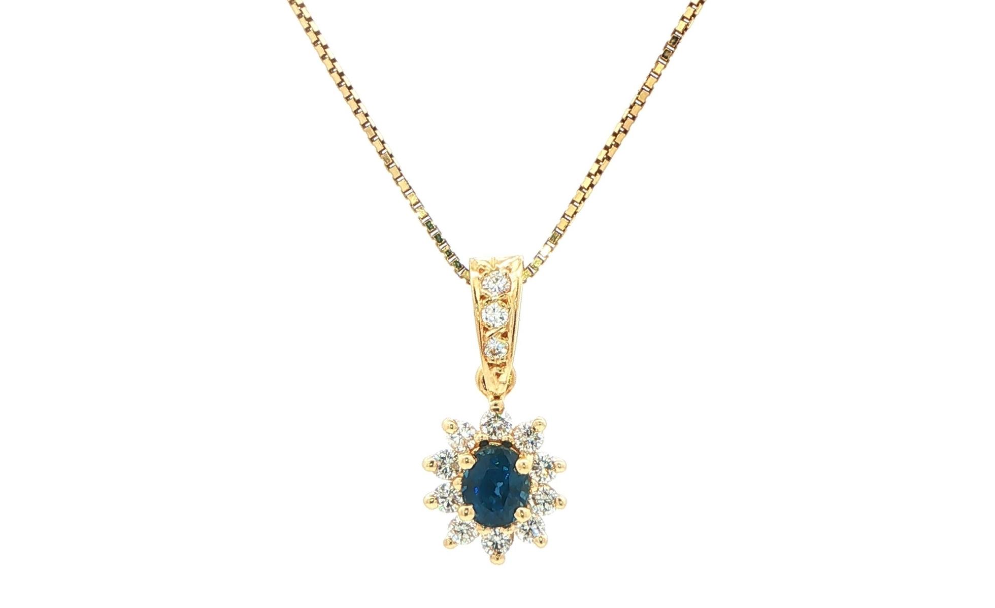 Estate Piece: Oval-cut Sapphire and Diamond Halo Pendant in Yellow Gold (0.75cts TWT)