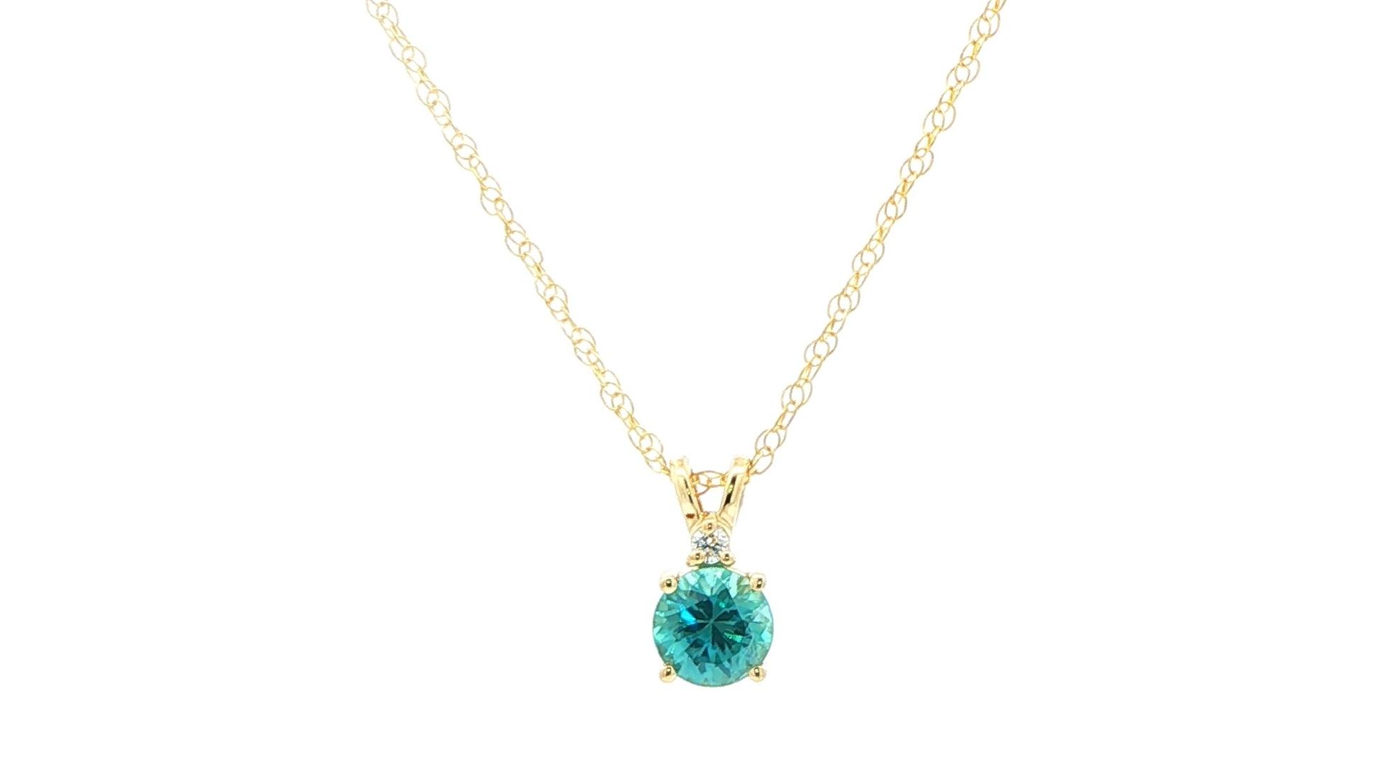 Estate Piece: 2-Stone Blue Zircon and Diamond Pendant in Yellow Gold (0.92cts TWT)