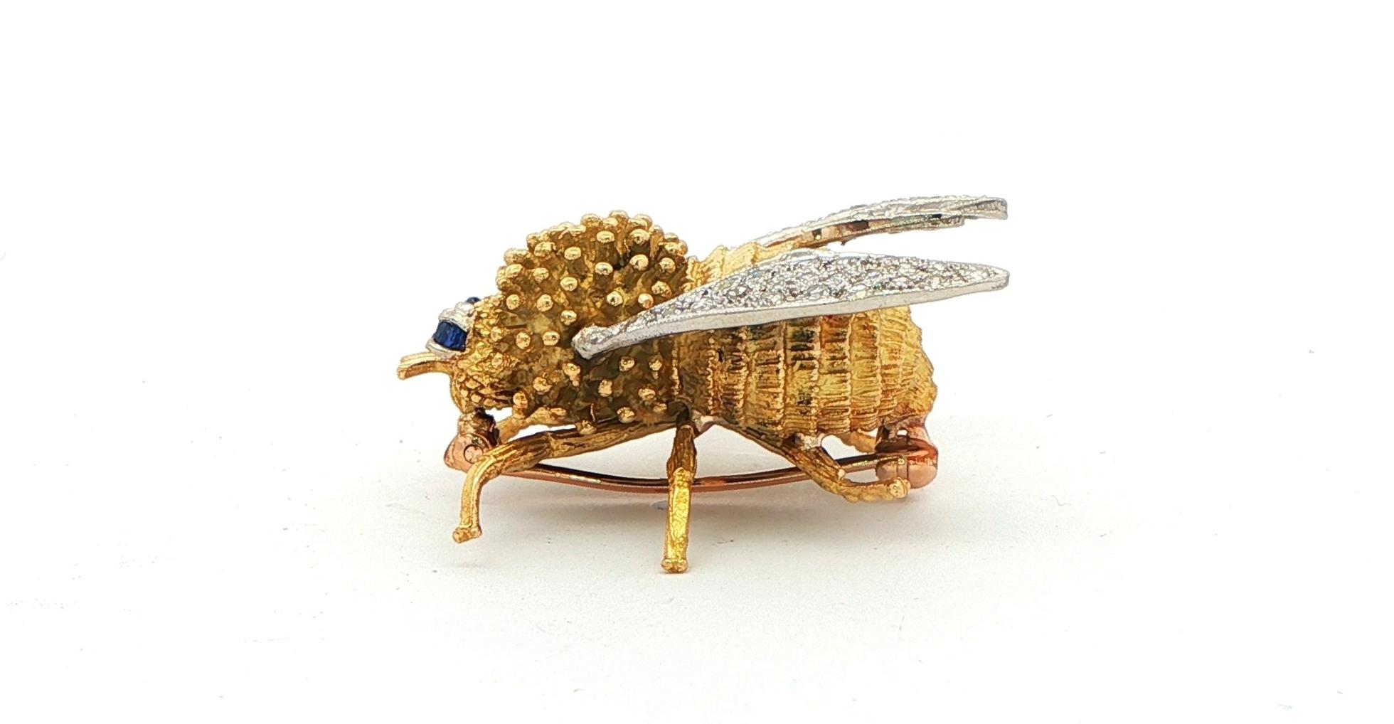 Estate Piece: Textured Gold Honeybee Brooch with Diamond Wings and Sapphire Eyes in Tow-tone Yellow and White Gold side