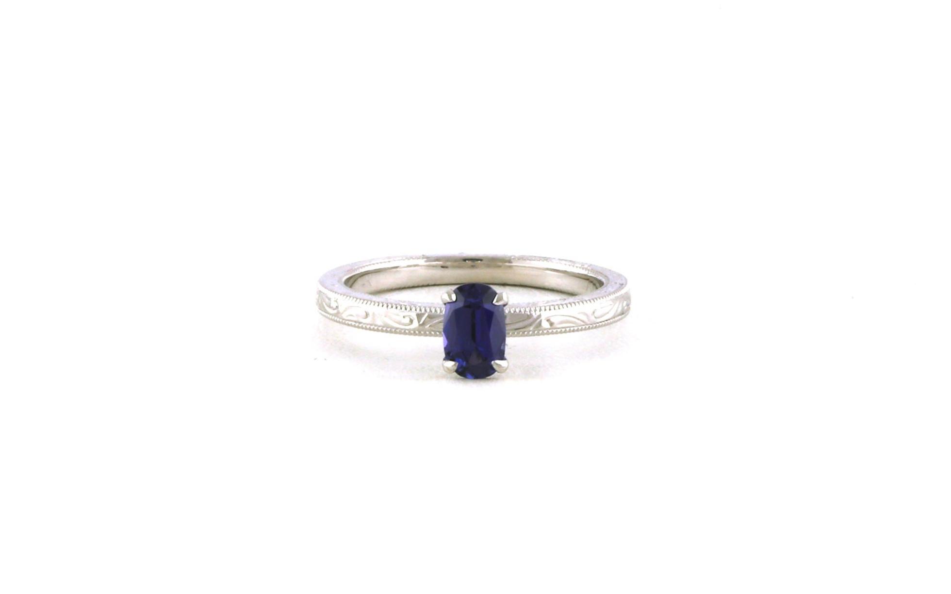 Hand Engraved Oval-cut Huckleberry SapphireSolitaire Ring in White Gold (0.54ct)