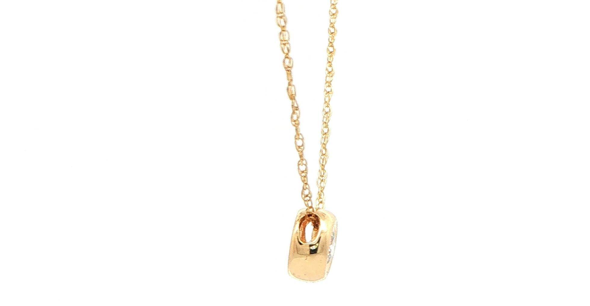 Estate Piece: Illusion Bezel-set Diamond Pendant Necklace in Yellow Gold (0.20cts) side