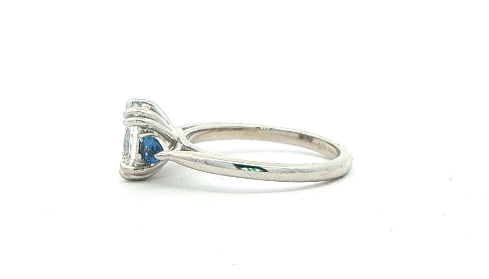 Radiant Cut Diamond and Pear Montana Yogo Sapphire Three-Stone Engagement Ring in Platinum (2.33cts TWT) side