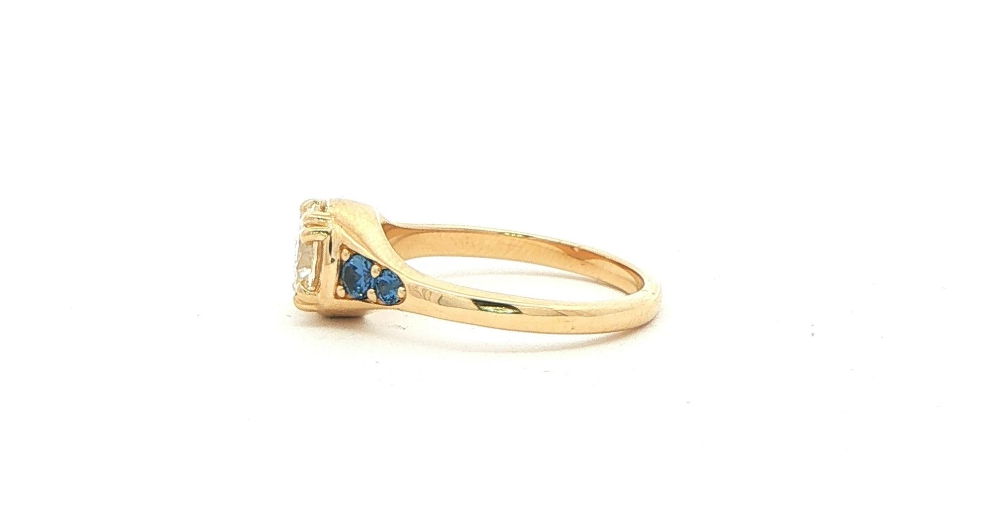 Diamond and Montana Yogo Sapphire Graduated Ring in Yellow Gold (1.27cts TWT) side