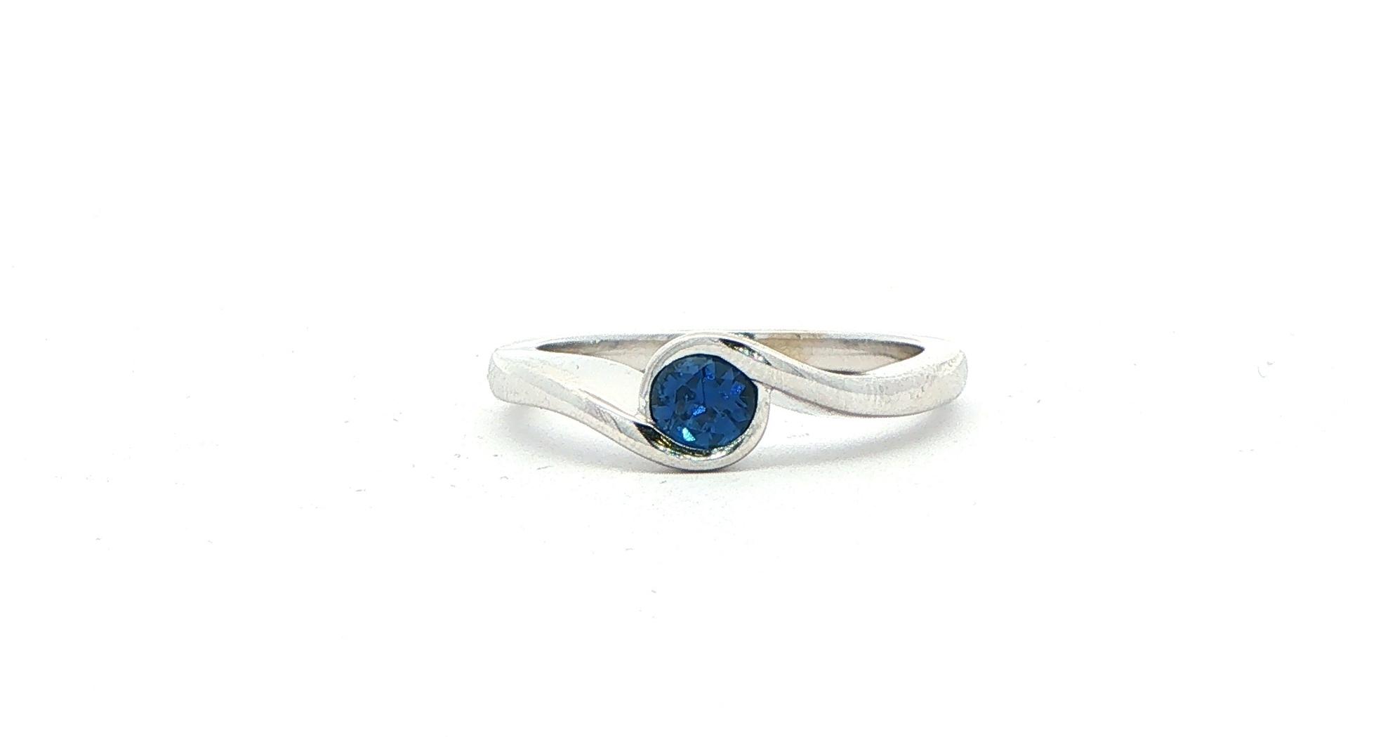 Estate Piece: Bezel-set Montana Yogo Sapphire Bypass Solitaire Ring in White Gold (0.48cts)