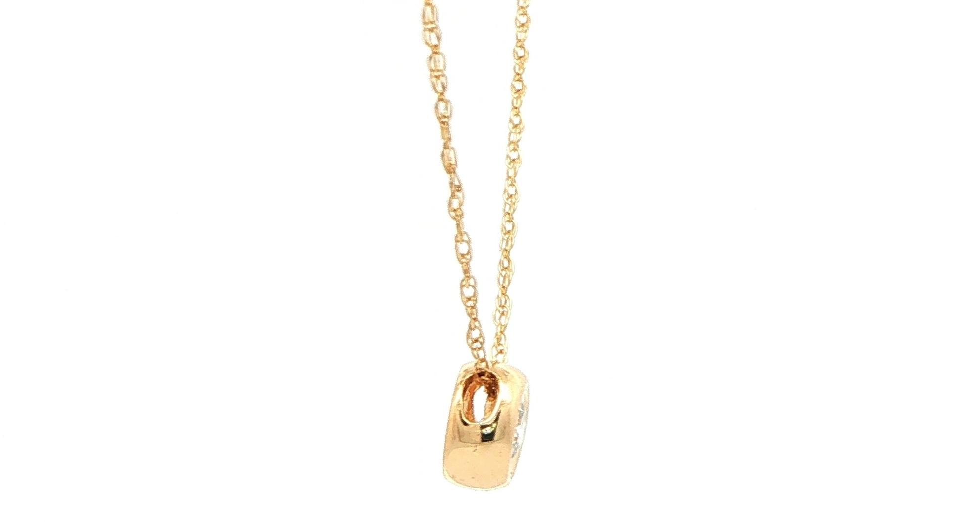 Estate Piece: Illusion Bezel-set Diamond Pendant Necklace in Yellow Gold (0.20cts) side