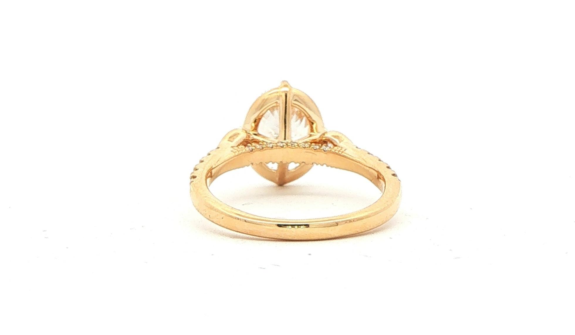 Oval-cut Center and Bezel-set Pear-cut Sides Engagement Ring Mounting with Pav&eacute; Accents in Yellow Gold (0.50cts TWT) back